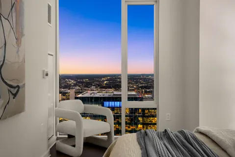 a view of a balcony with city view