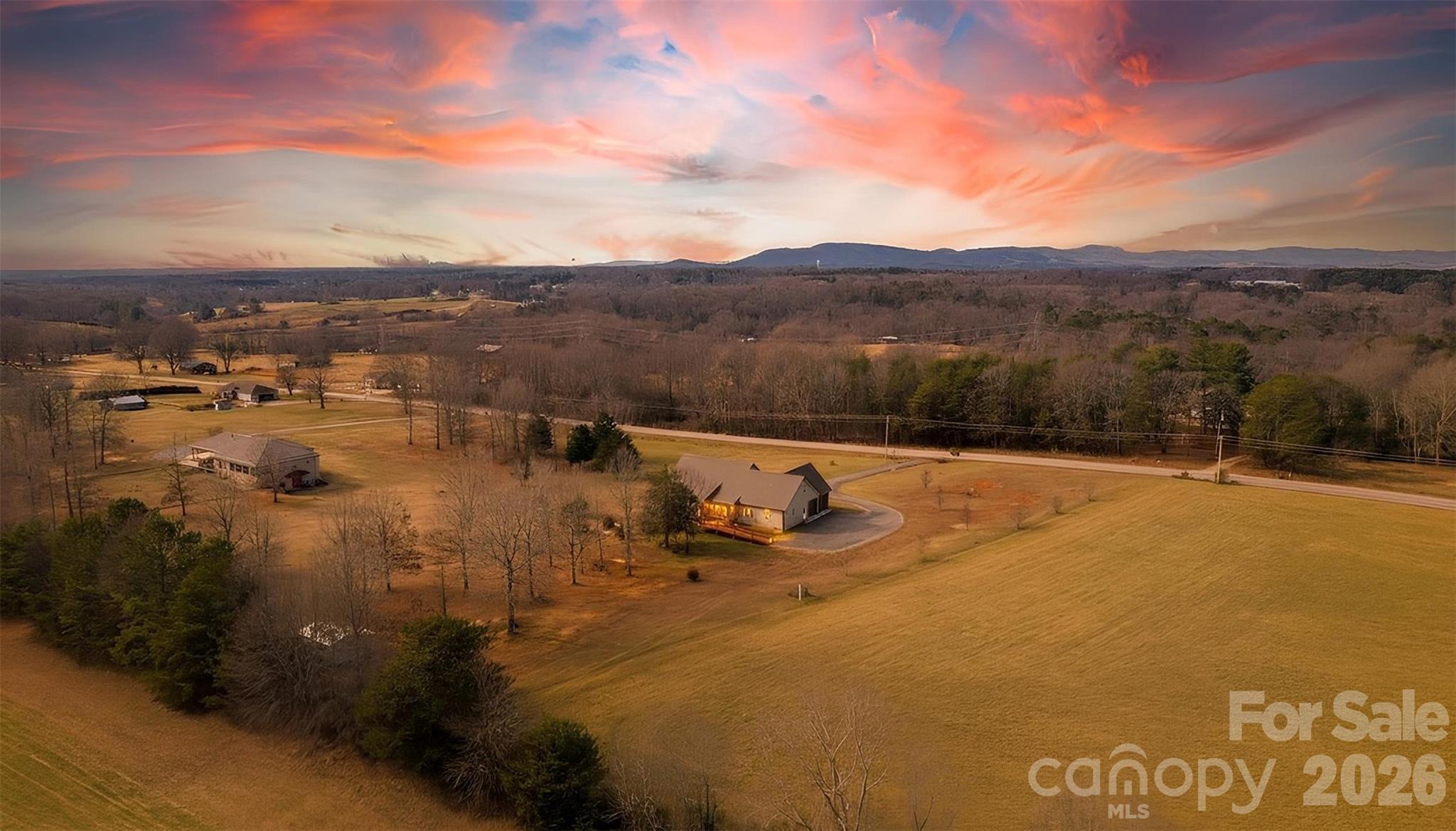 445 Warren Road Taylorsville, NC 28681 - Photo 11 of 48 a view of a lake with a mountain