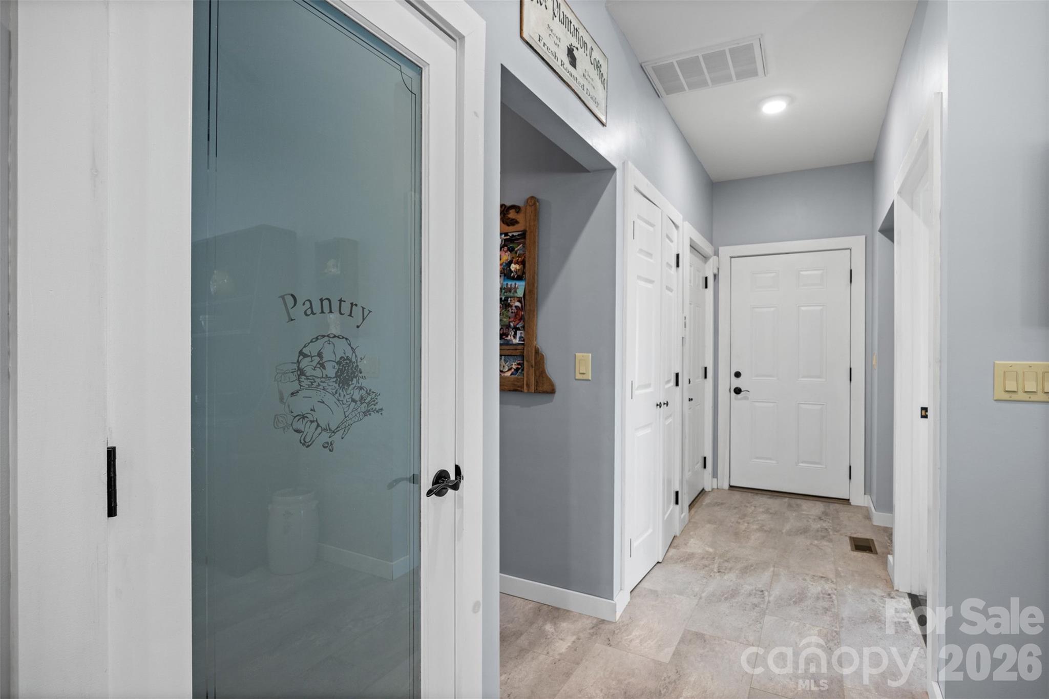 445 Warren Road Taylorsville, NC 28681 - Photo 21 of 48 a view of a hallway with closet and bathroom