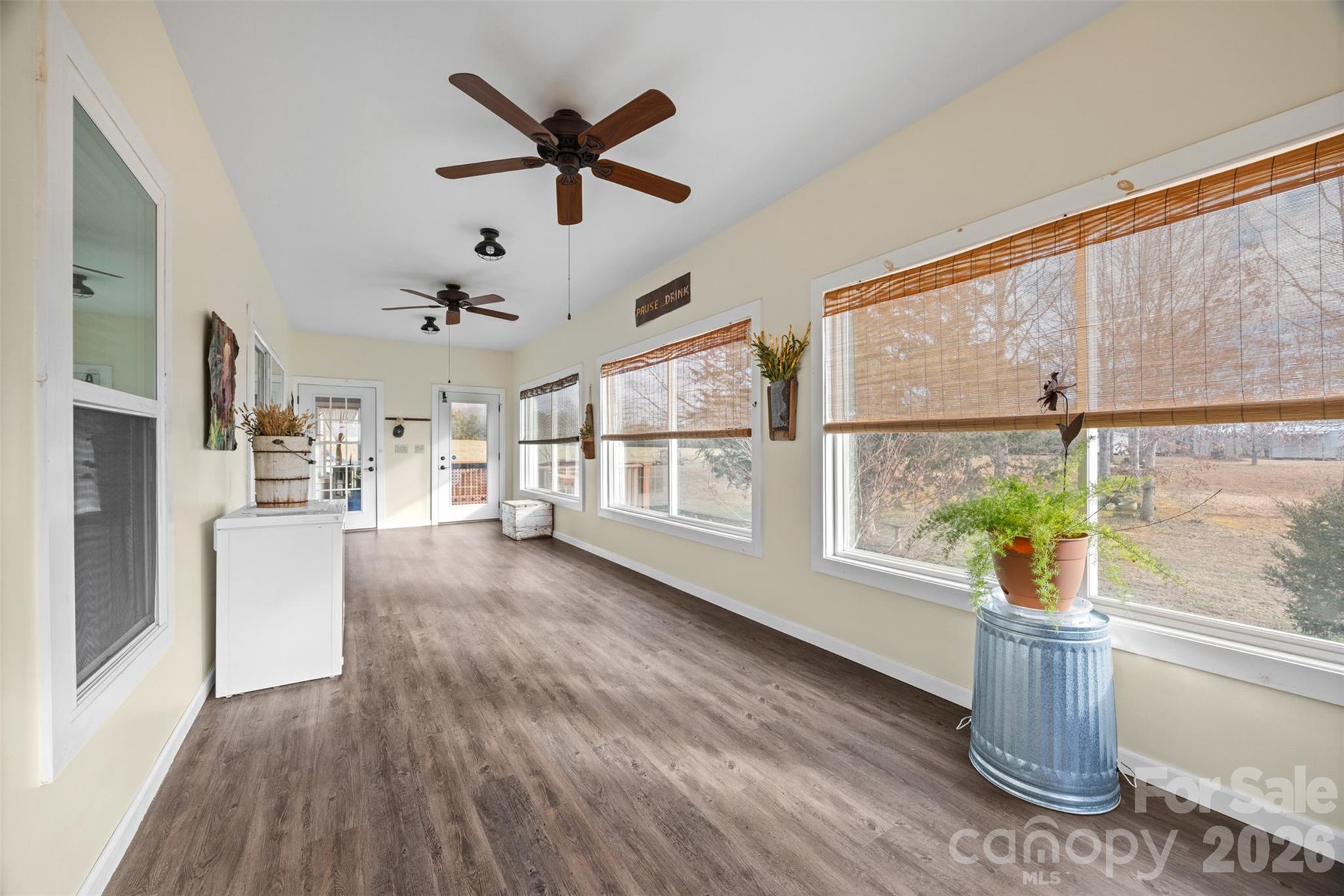 445 Warren Road Taylorsville, NC 28681 - Photo 23 of 48 a view of living room with furniture and windows