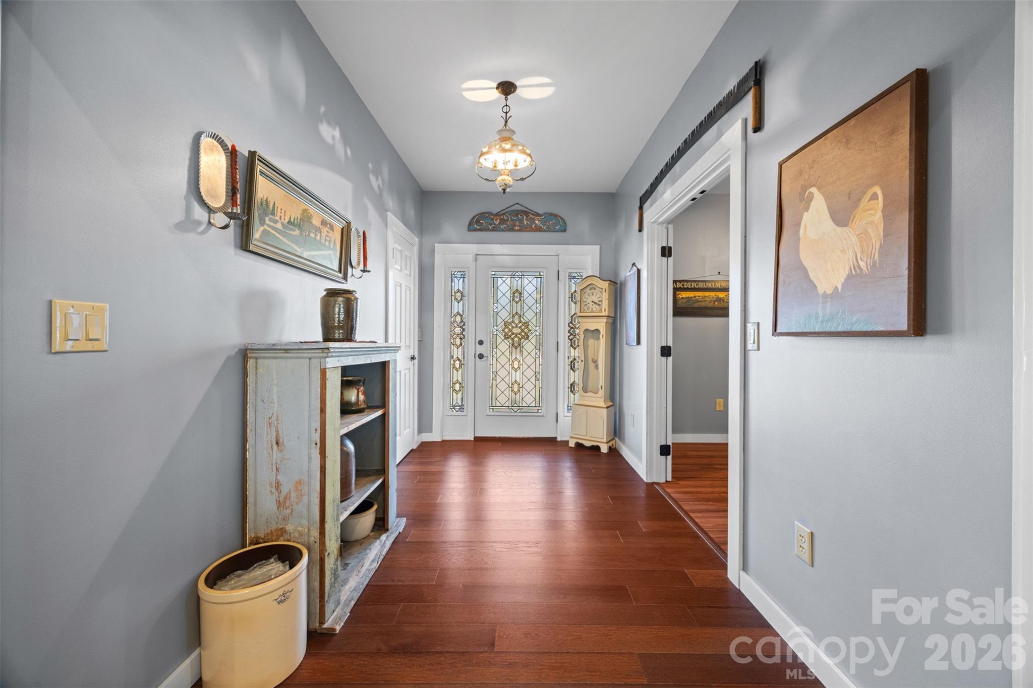 445 Warren Road Taylorsville, NC 28681 - Photo 24 of 48 a view of entryway with furniture and wooden floor
