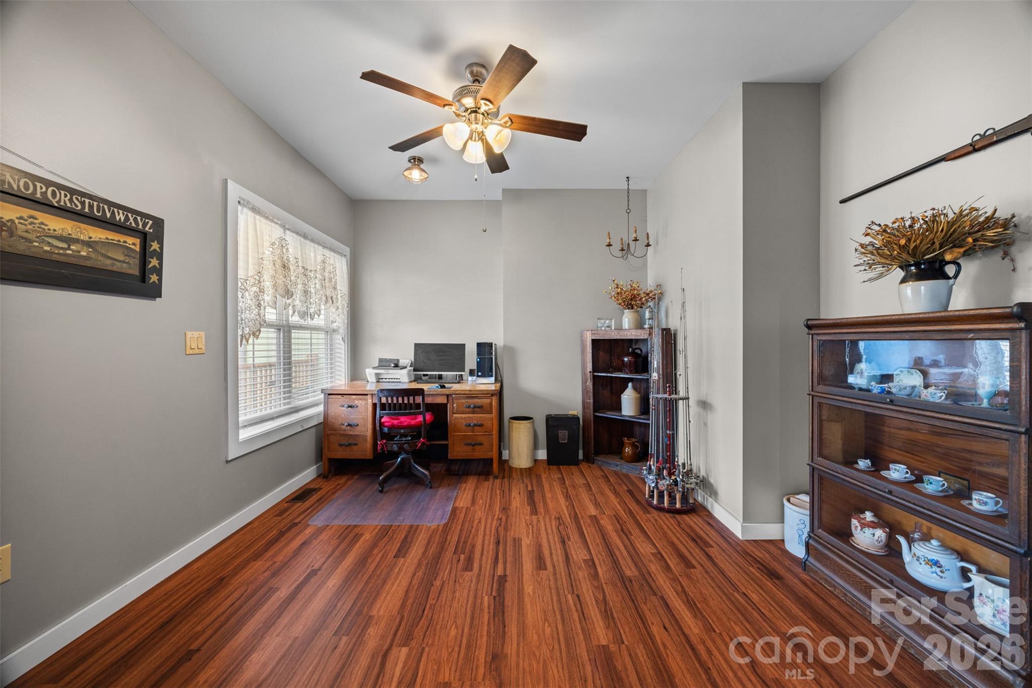 445 Warren Road Taylorsville, NC 28681 - Photo 25 of 48 a living room with furniture and wooden floor