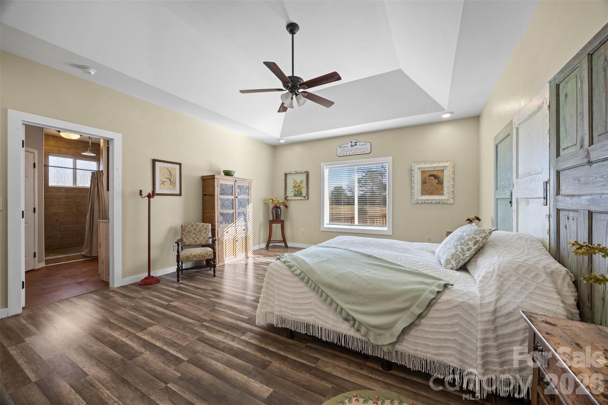 445 Warren Road Taylorsville, NC 28681 - Photo 26 of 48 a bedroom with a bed closet and a window