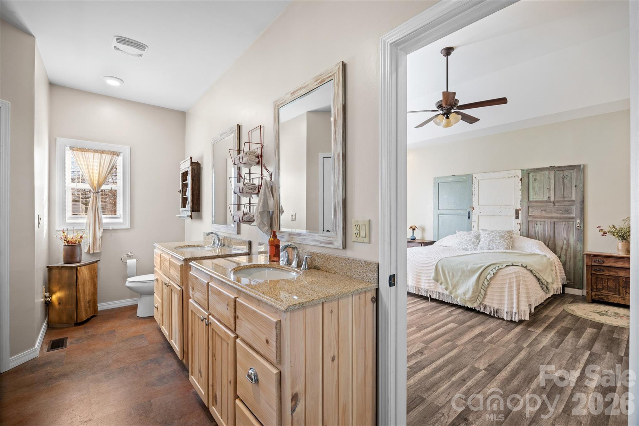445 Warren Road Taylorsville, NC 28681 - Photo 28 of 48 a spacious bedroom with a bed and a walk in closet