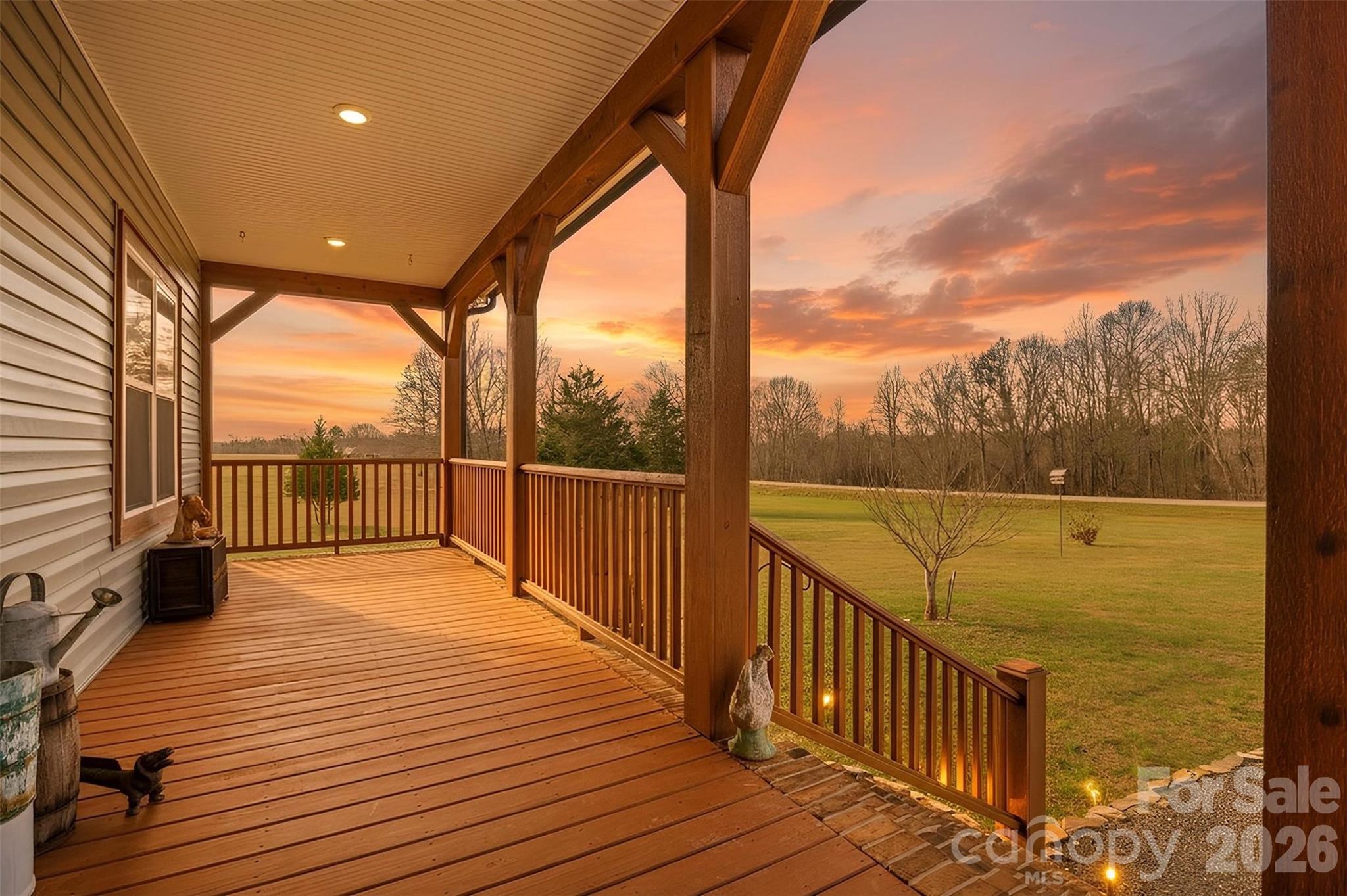 445 Warren Road Taylorsville, NC 28681 - Photo 4 of 48 a view of balcony with wooden floor and fence