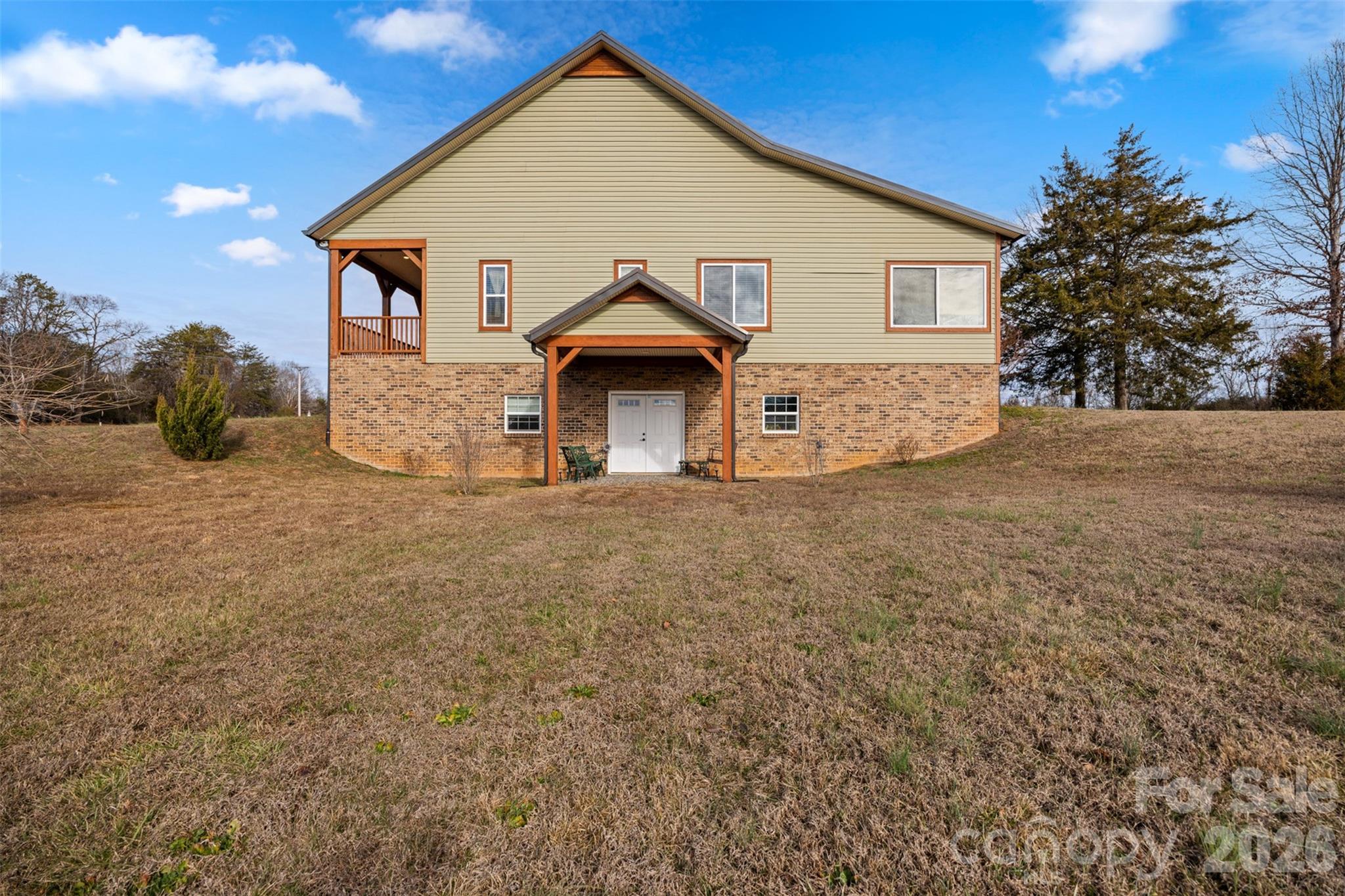 445 Warren Road Taylorsville, NC 28681 - Photo 46 of 48 a view of a house with a yard