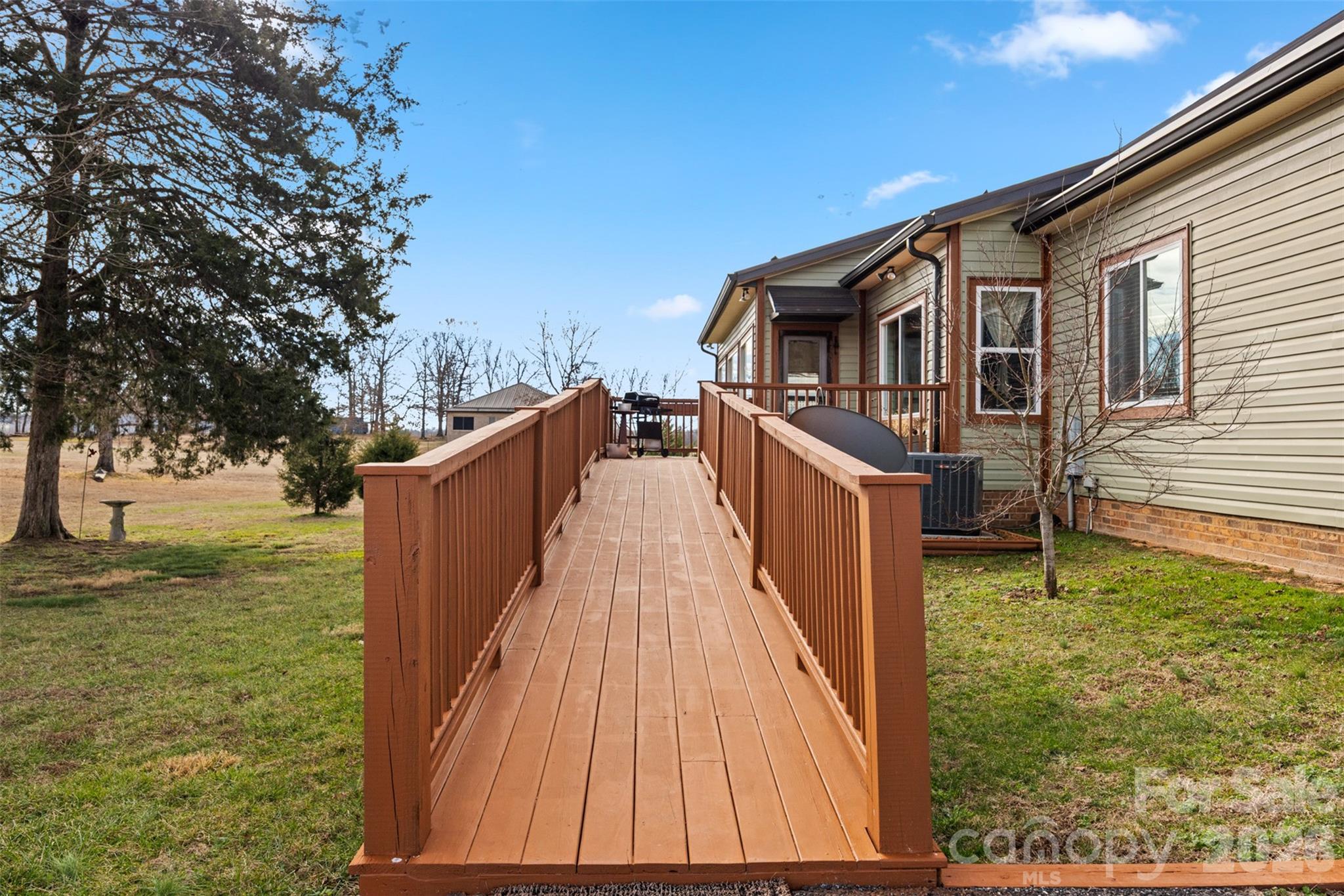 445 Warren Road Taylorsville, NC 28681 - Photo 47 of 48 a view of a house with backyard