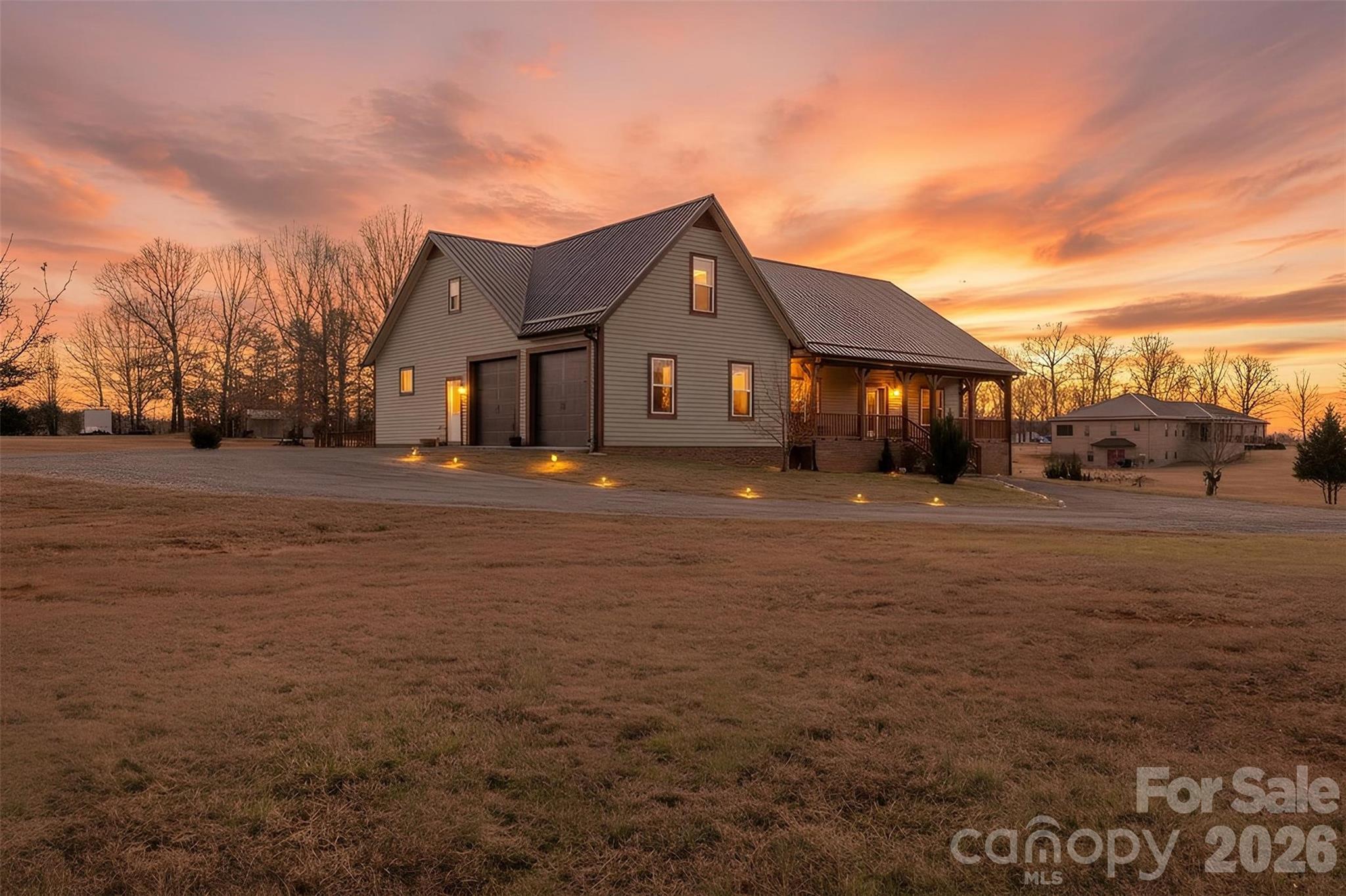 445 Warren Road Taylorsville, NC 28681 - Photo 5 of 48 a front view of a house with a yard
