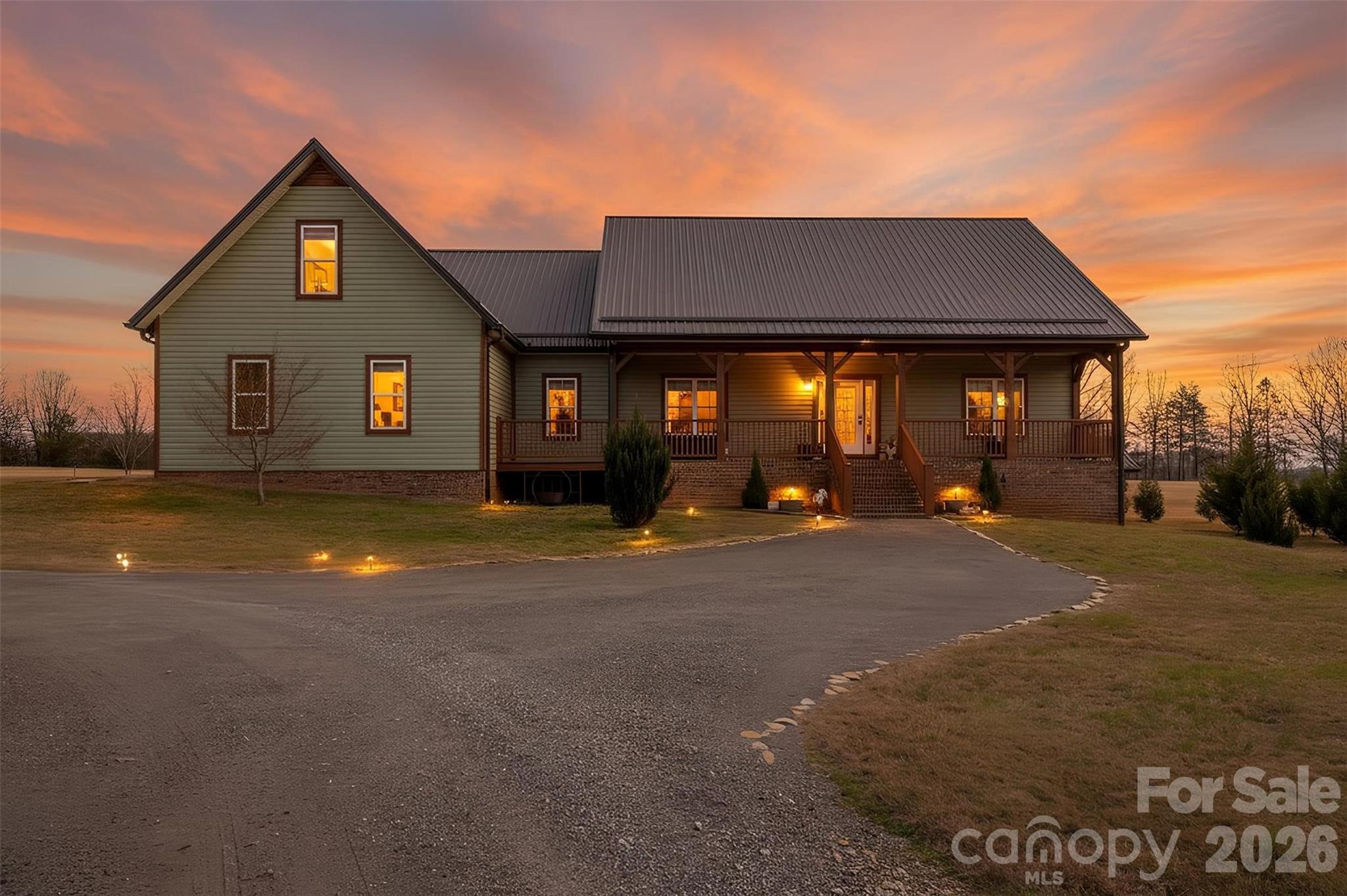 445 Warren Road Taylorsville, NC 28681 - Photo 10 of 48 a front view of house with yard
