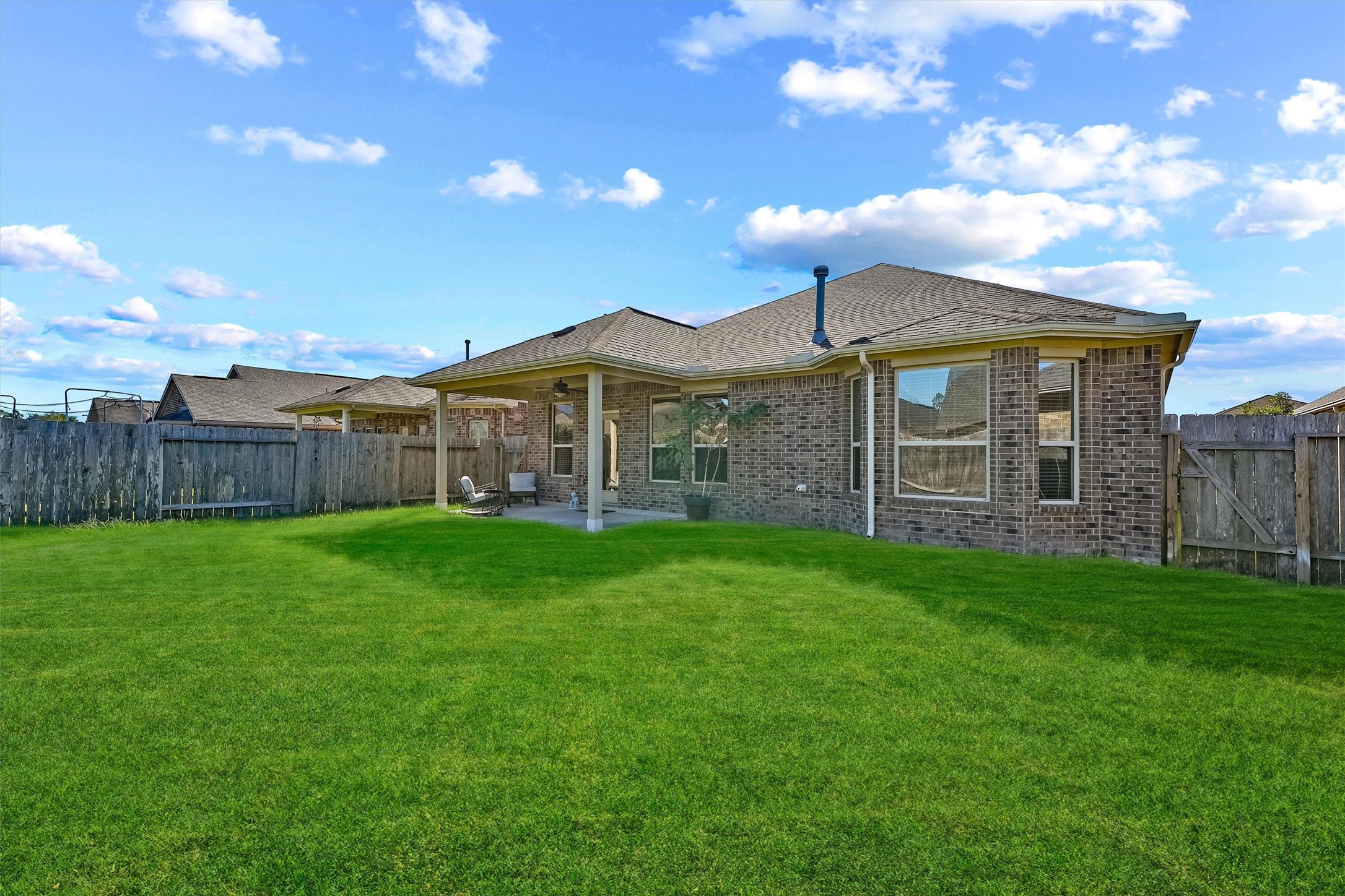 3841 Enchanted Timbers Lane Spring, TX 77386 - Photo 20 of 28 a view of a house with a backyard