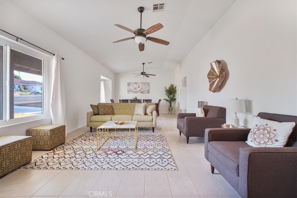 79040 Cliff Street Bermuda Dunes, CA 92203 - Photo 16 of 42 a living room with furniture rug and window