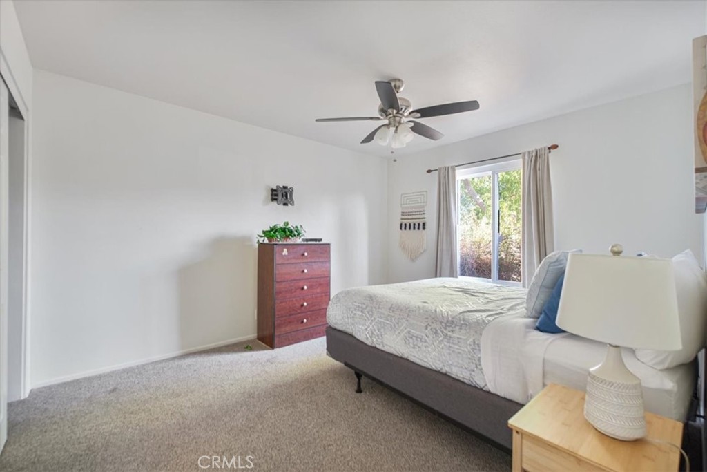 79040 Cliff Street Bermuda Dunes, CA 92203 - Photo 25 of 42 a bedroom with a bed and window