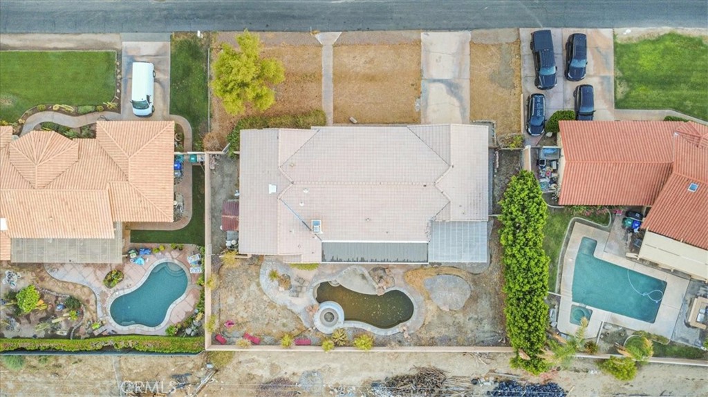 79040 Cliff Street Bermuda Dunes, CA 92203 - Photo 41 of 42 an aerial view of a house with a swimming pool