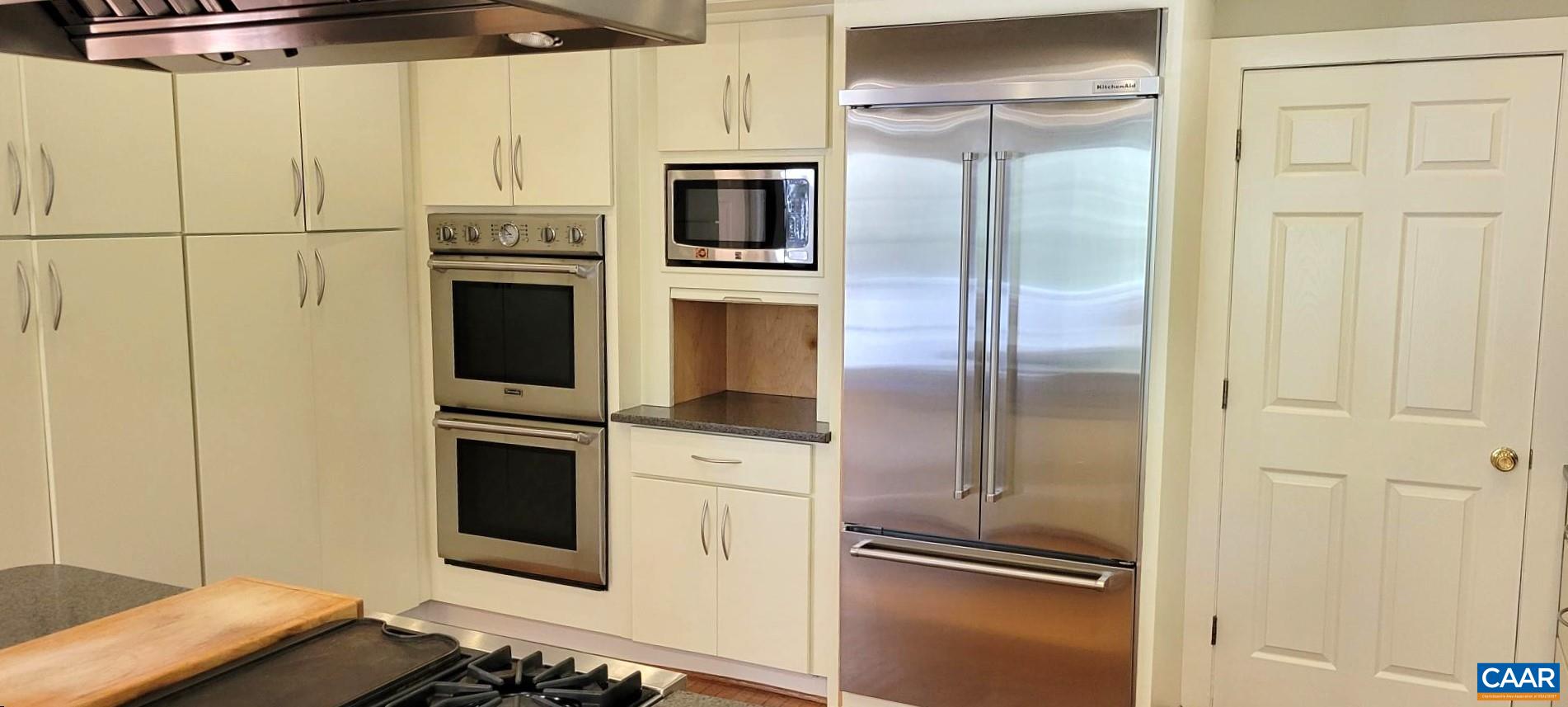 1912 Blue Ridge Road Charlottesville, VA 22903 - Photo 12 of 49 a kitchen with cabinets and stainless steel appliances