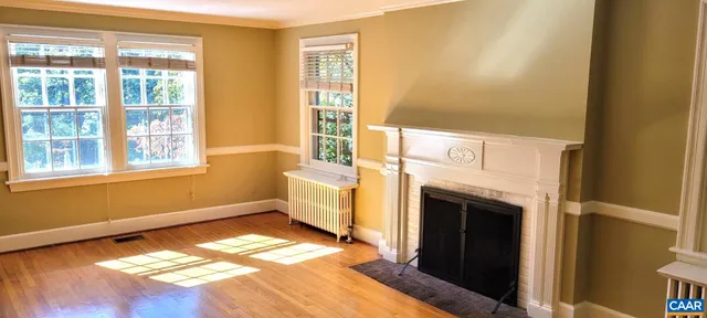 a view of a livingroom with a fireplace