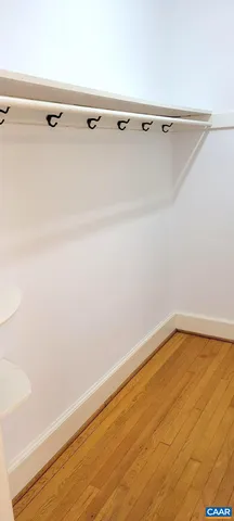 a view of a room with racks on the wall