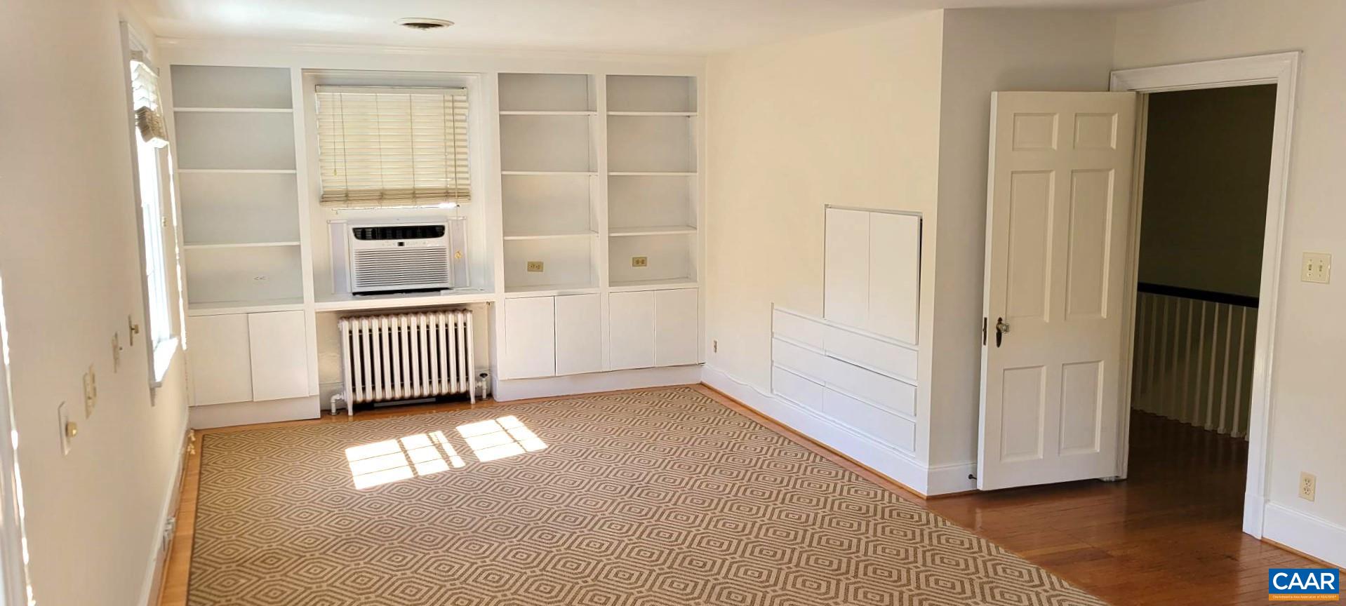 1912 Blue Ridge Road Charlottesville, VA 22903 - Photo 30 of 49 an empty room with windows