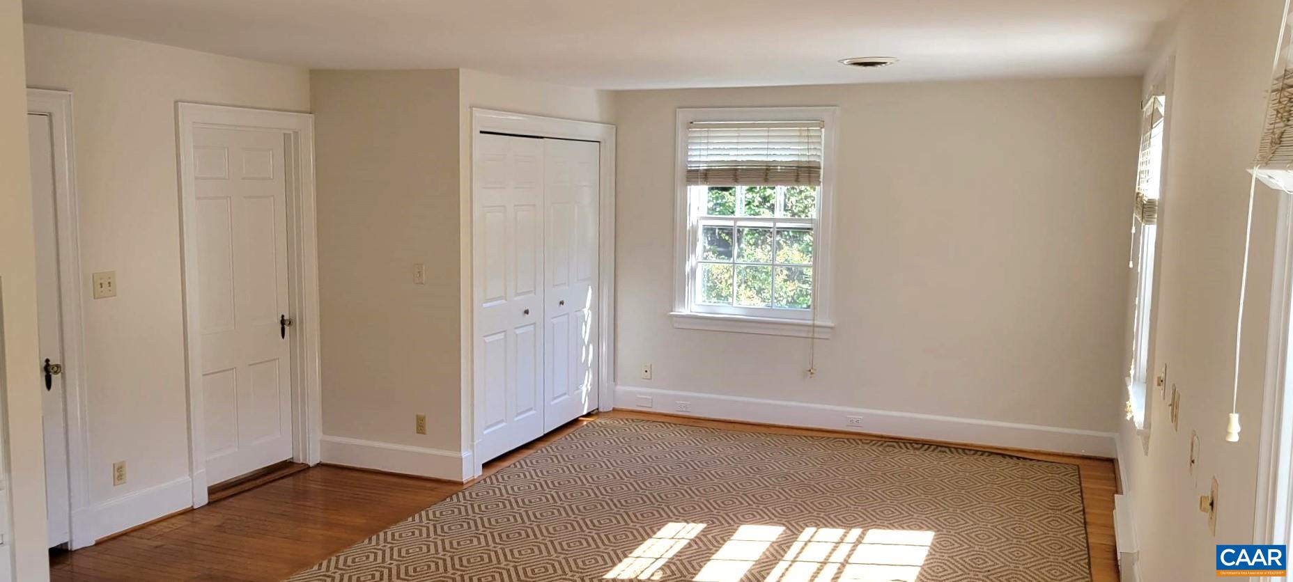 1912 Blue Ridge Road Charlottesville, VA 22903 - Photo 31 of 49 a view of an empty room with a window