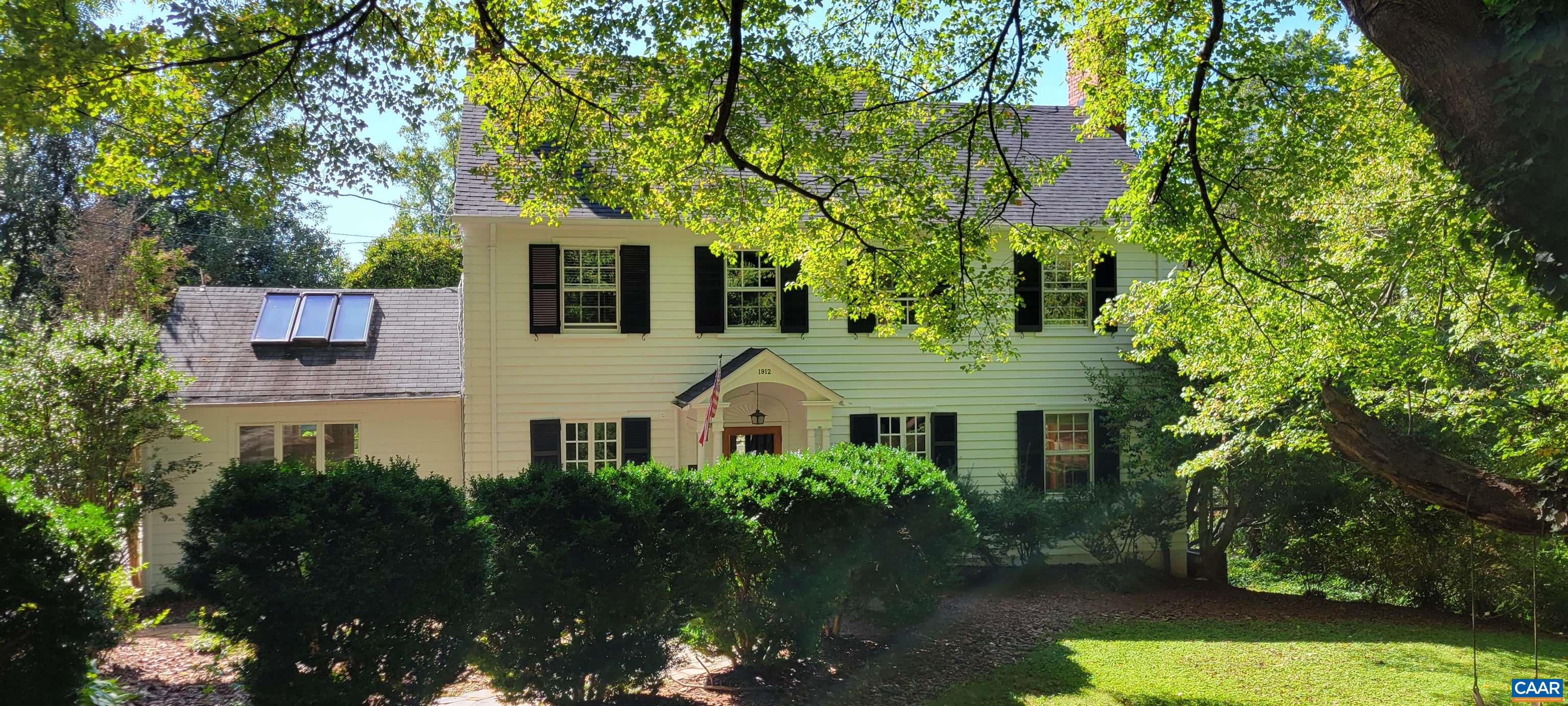 1912 Blue Ridge Road Charlottesville, VA 22903 - Photo 4 of 49 a front view of a house with garden