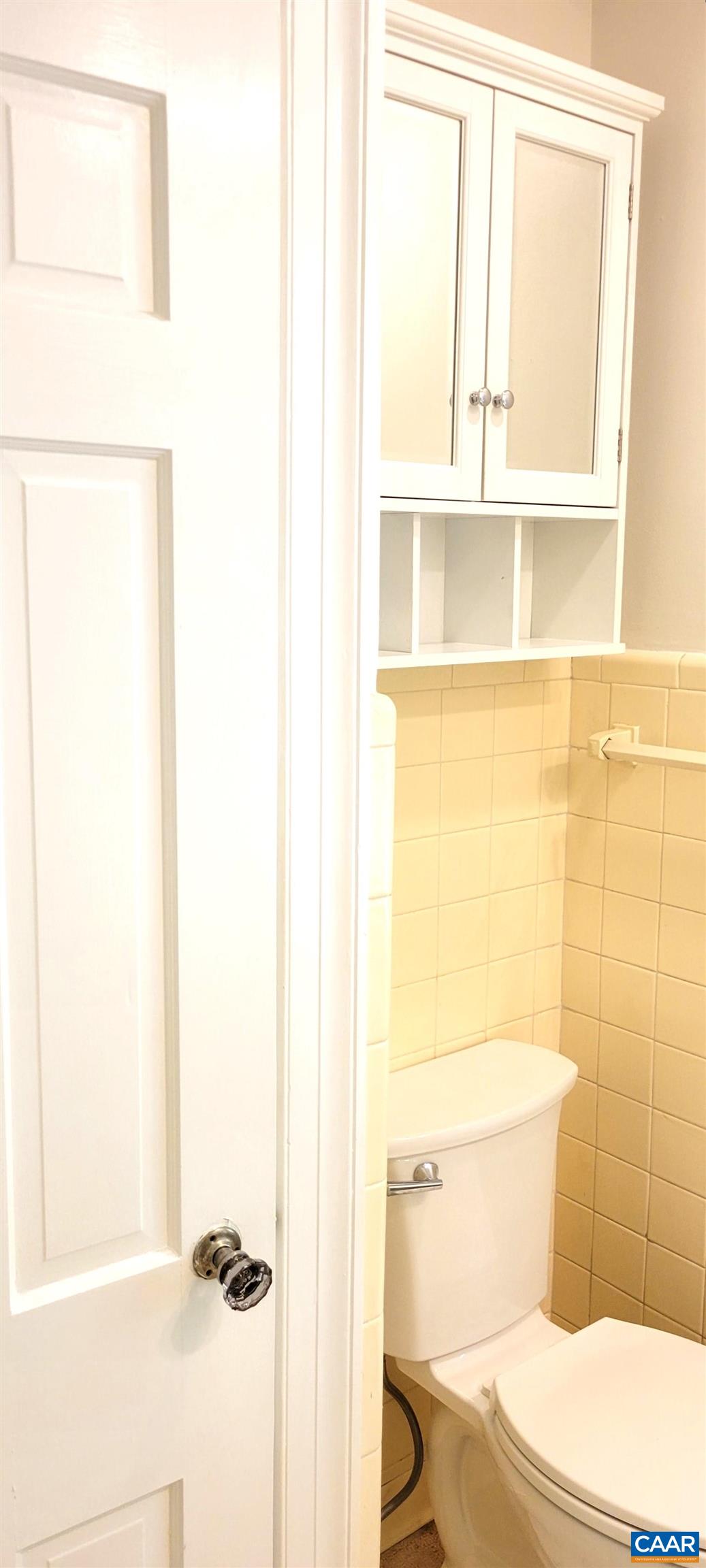 1912 Blue Ridge Road Charlottesville, VA 22903 - Photo 41 of 49 a bathroom with a toilet and a window
