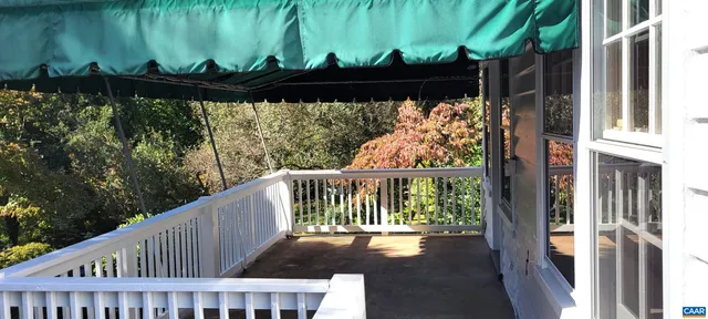 a view of balcony with a garden