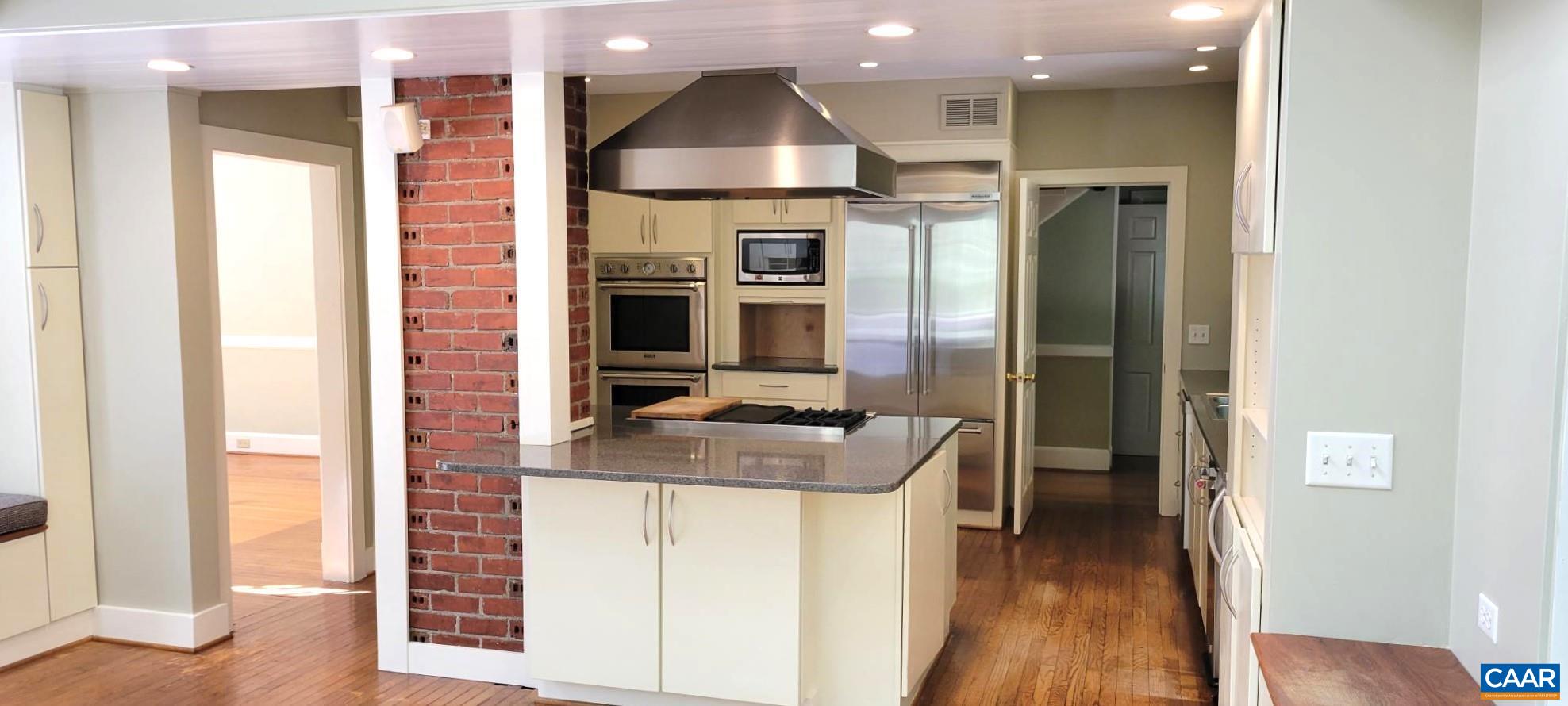 1912 Blue Ridge Road Charlottesville, VA 22903 - Photo 9 of 49 a kitchen with stainless steel appliances granite countertop a refrigerator and a stove