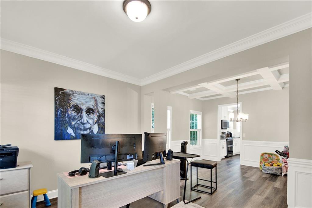 407 Corinth Church Road Winder, GA 30680 - Photo 12 of 66 a view of a workspace with furniture and a livingroom