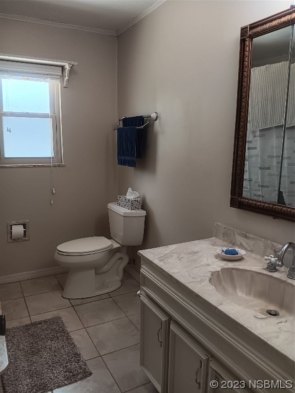 4141 Sterling Street Mims, FL 32754 - Photo 12 of 20 a bathroom with a toilet a sink and mirror