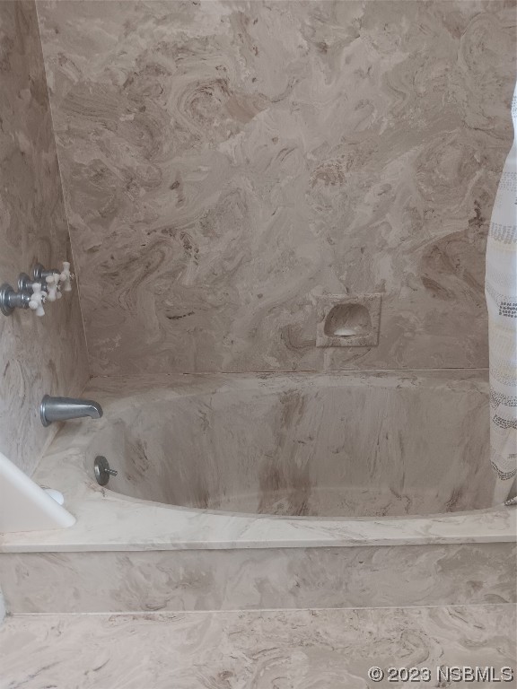 4141 Sterling Street Mims, FL 32754 - Photo 13 of 20 a bathroom with a bathtub