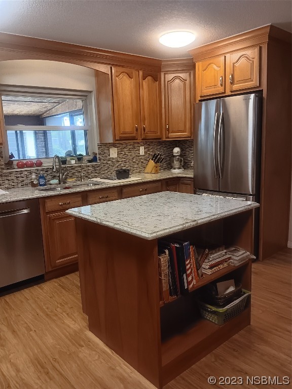 4141 Sterling Street Mims, FL 32754 - Photo 7 of 20 a kitchen with stainless steel appliances granite countertop a refrigerator and a stove