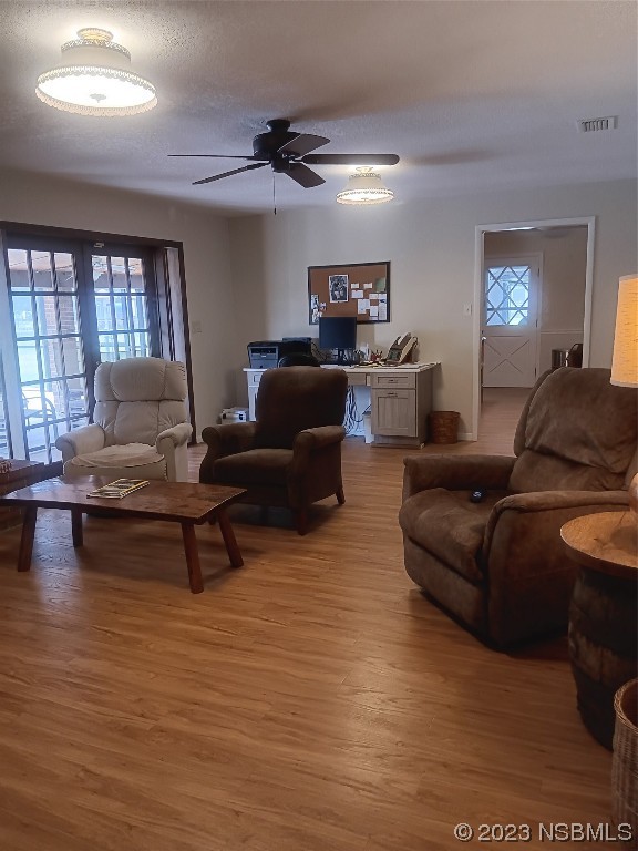 4141 Sterling Street Mims, FL 32754 - Photo 9 of 20 a living room with furniture and a wooden floor