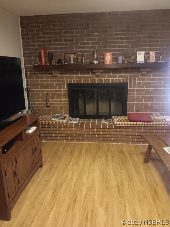 4141 Sterling Street Mims, FL 32754 - Photo 10 of 20 a view of a fireplace with wooden floor