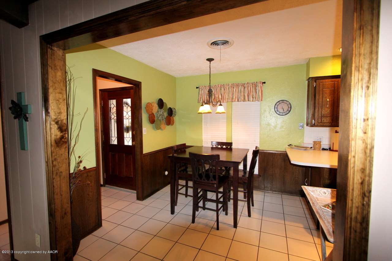 5304 South Fannin Street Amarillo, TX 79110 - Photo 16 of 23 a view of a dining room with furniture