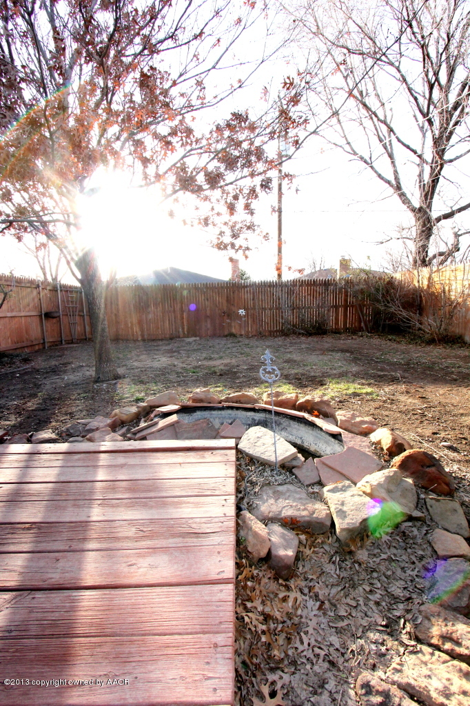 5304 South Fannin Street Amarillo, TX 79110 - Photo 22 of 23 a view of a yard with an outdoor space