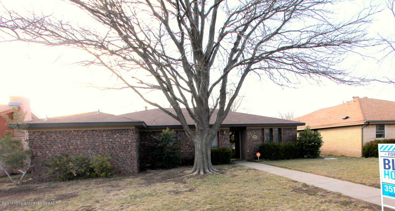 5304 South Fannin Street Amarillo, TX 79110 - Photo 3 of 23 a view of a house with a large tree