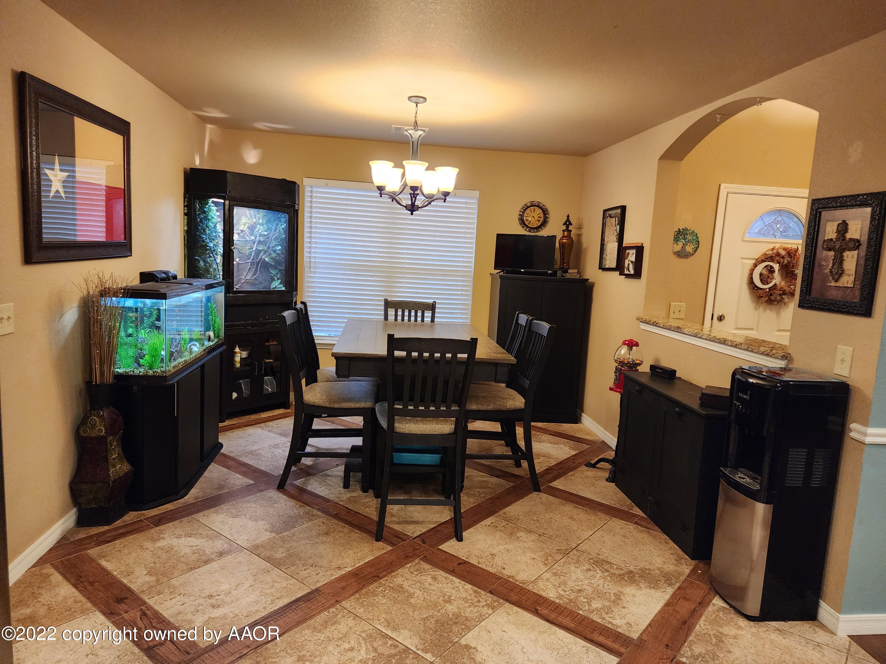 3912 Arden Road Amarillo, TX 79118 - Photo 15 of 35 a view of a dining room with furniture