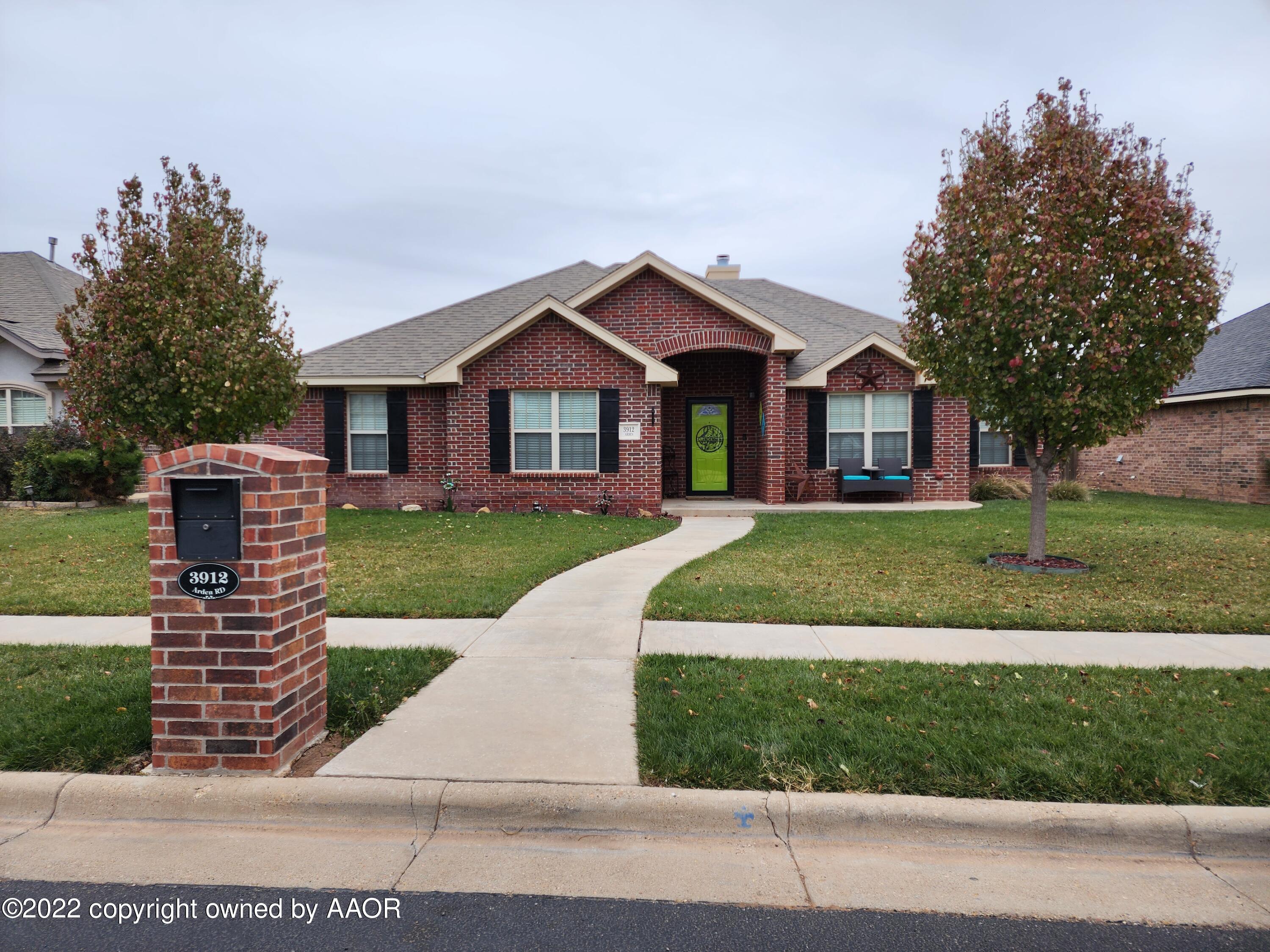 3912 Arden Road Amarillo, TX 79118 - Photo 2 of 35 a front view of a house with a yard