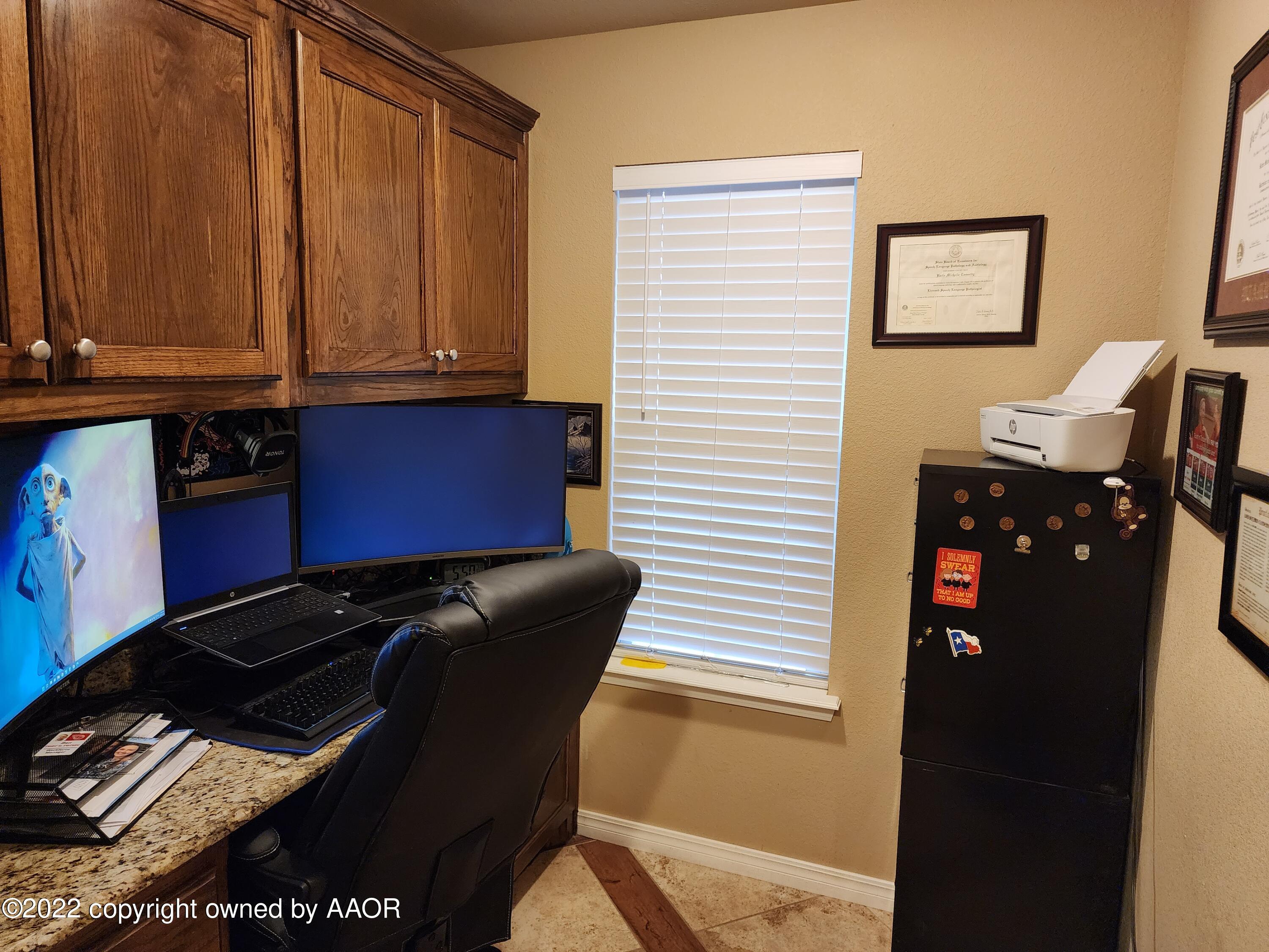 3912 Arden Road Amarillo, TX 79118 - Photo 29 of 35 a view of a dresser with wooden floor
