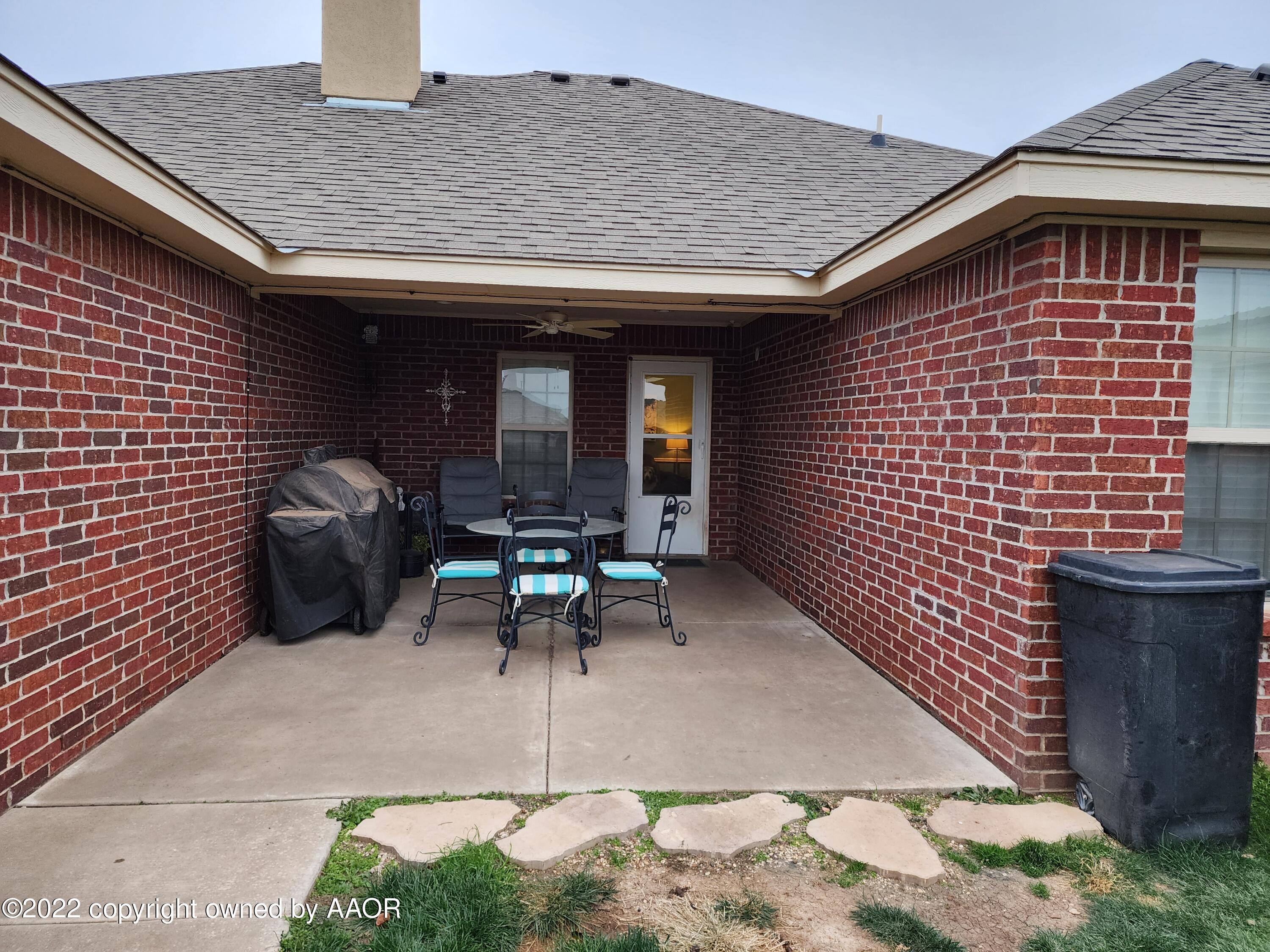 3912 Arden Road Amarillo, TX 79118 - Photo 34 of 35 a front view of a house with outdoor seating
