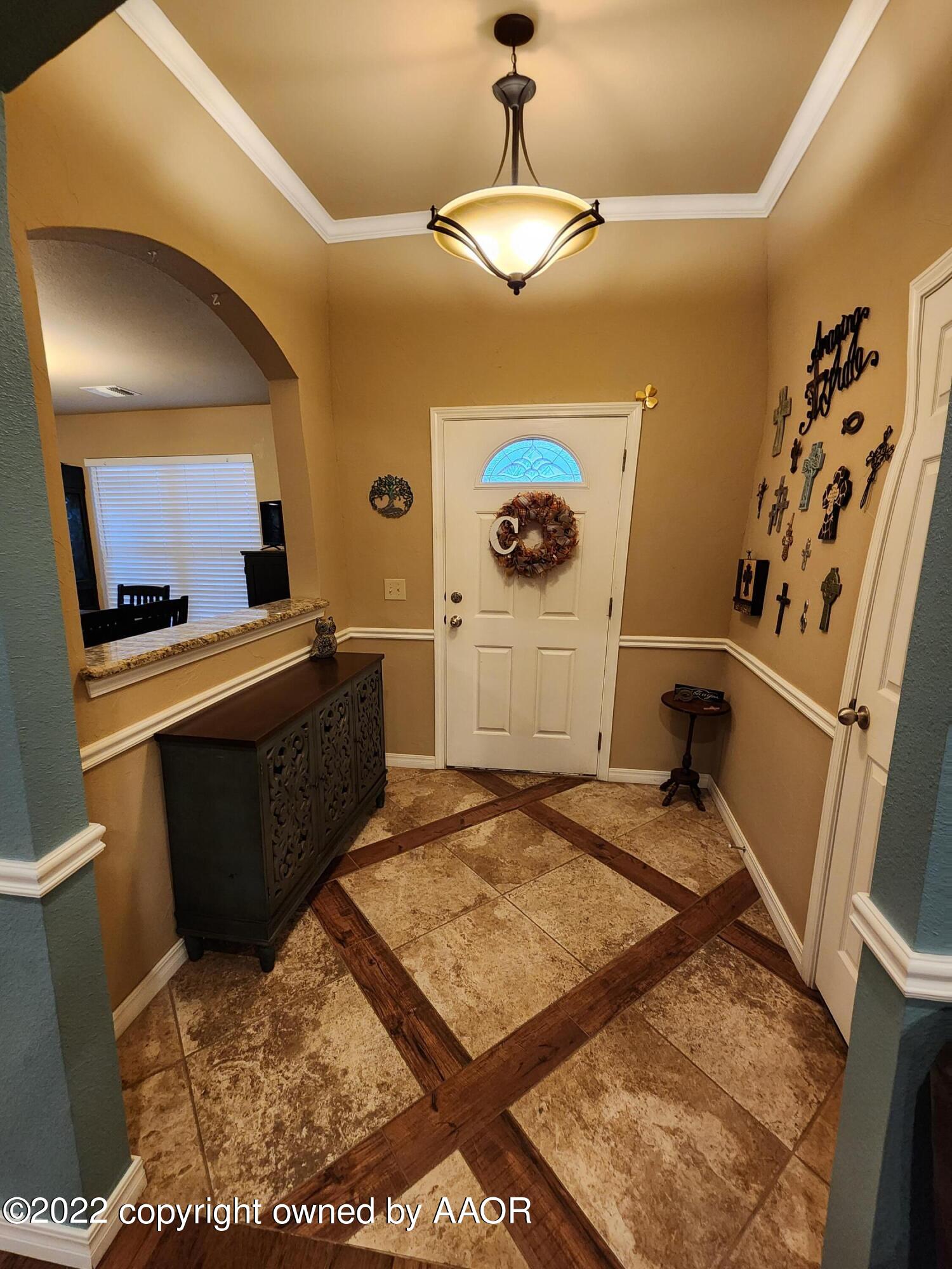 3912 Arden Road Amarillo, TX 79118 - Photo 5 of 35 a bedroom with a bed and a sink