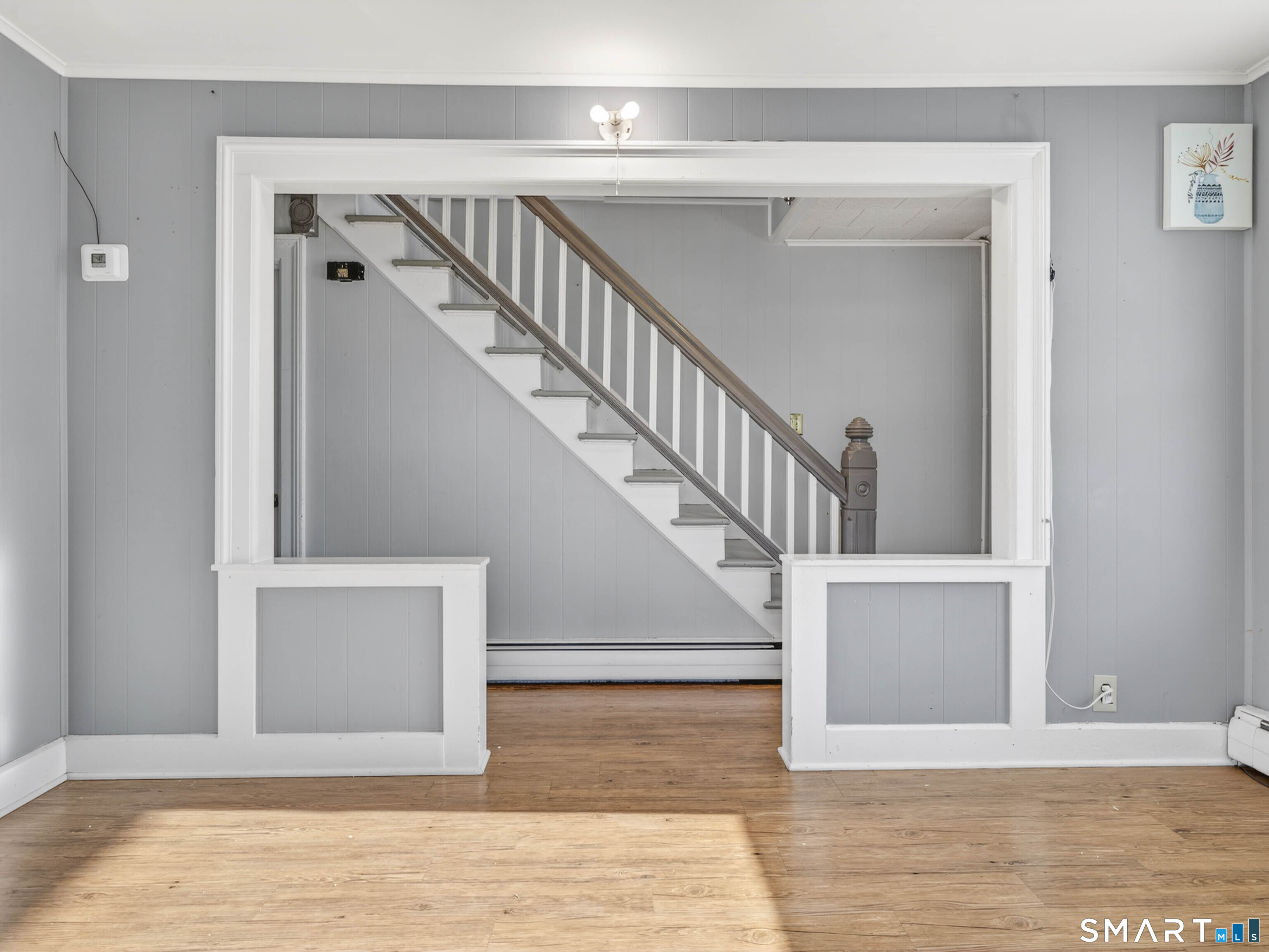 12 Clover Court New London, CT 06320 - Photo 11 of 29 a view of entryway and hall with wooden floor