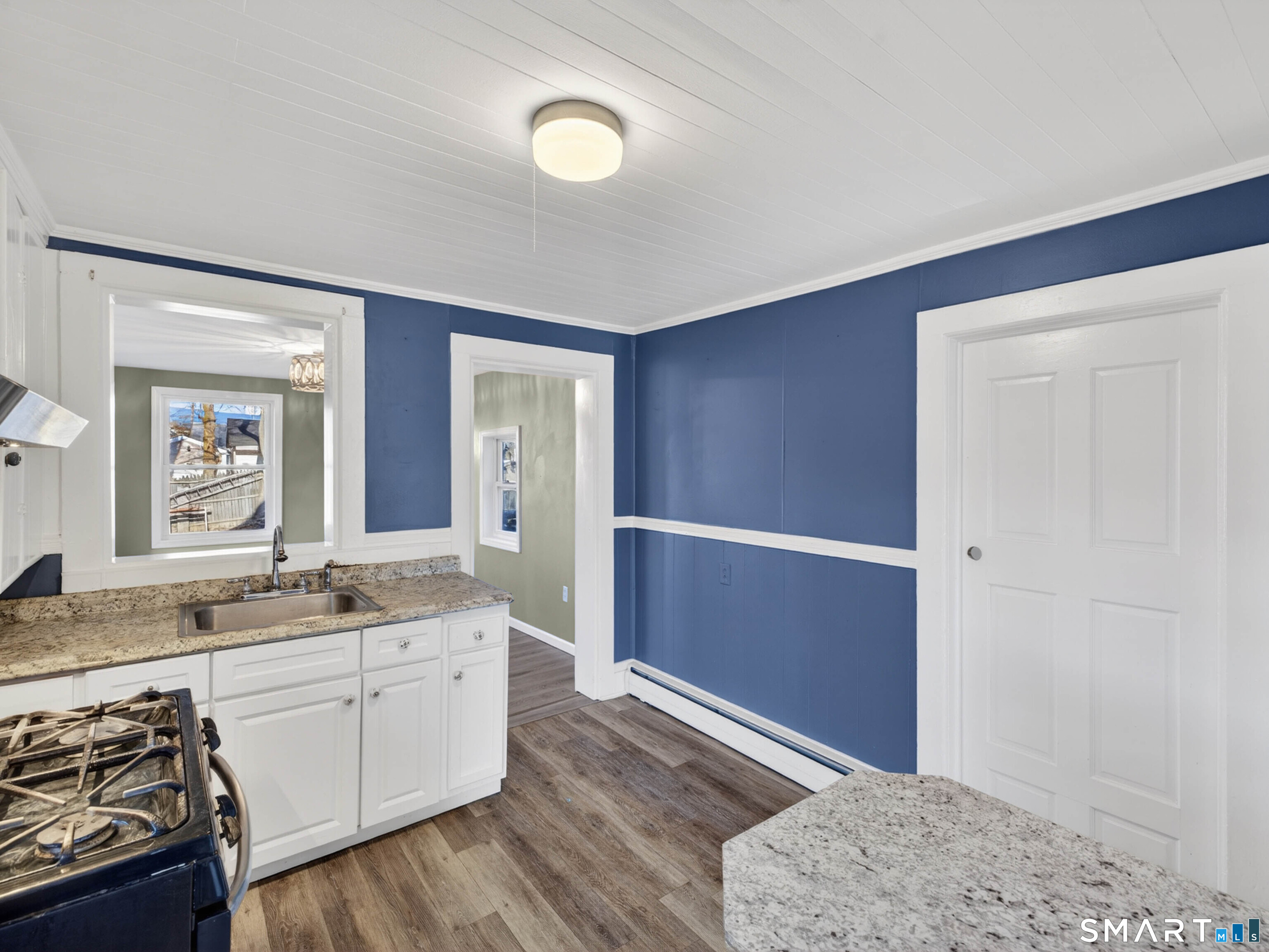 12 Clover Court New London, CT 06320 - Photo 17 of 29 a spacious bathroom with a granite countertop sink and a mirror