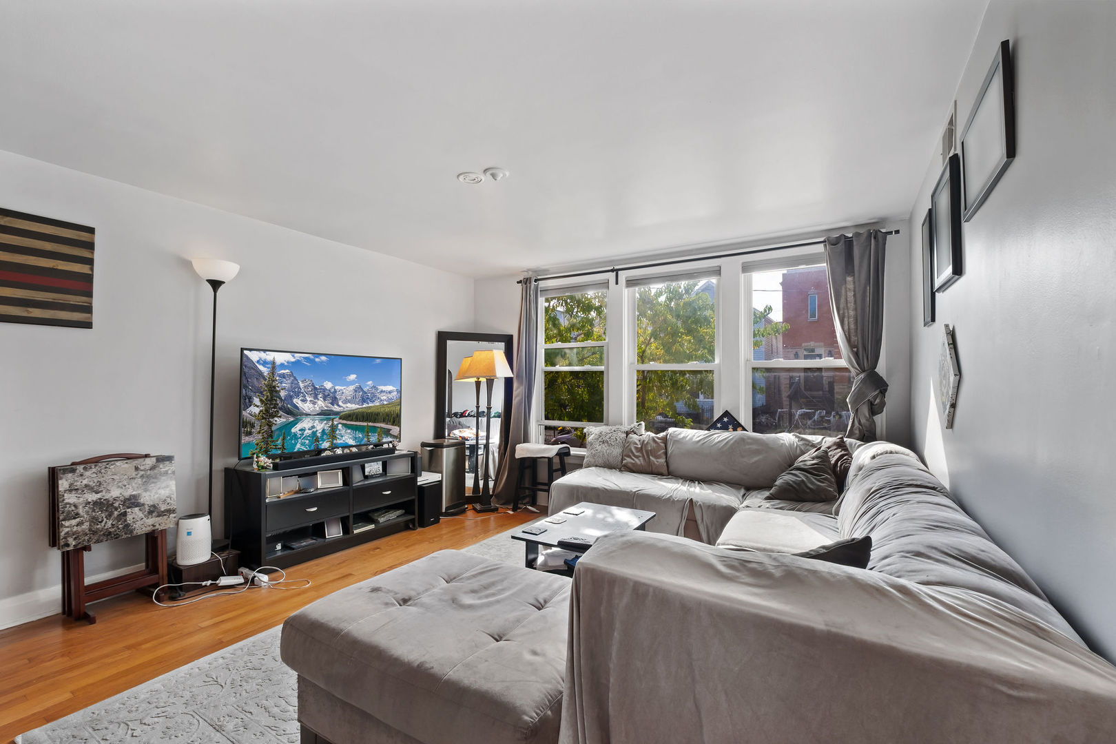 1934 West Race Avenue Chicago, IL 60622 - Photo 11 of 35 a living room with furniture and a flat screen tv