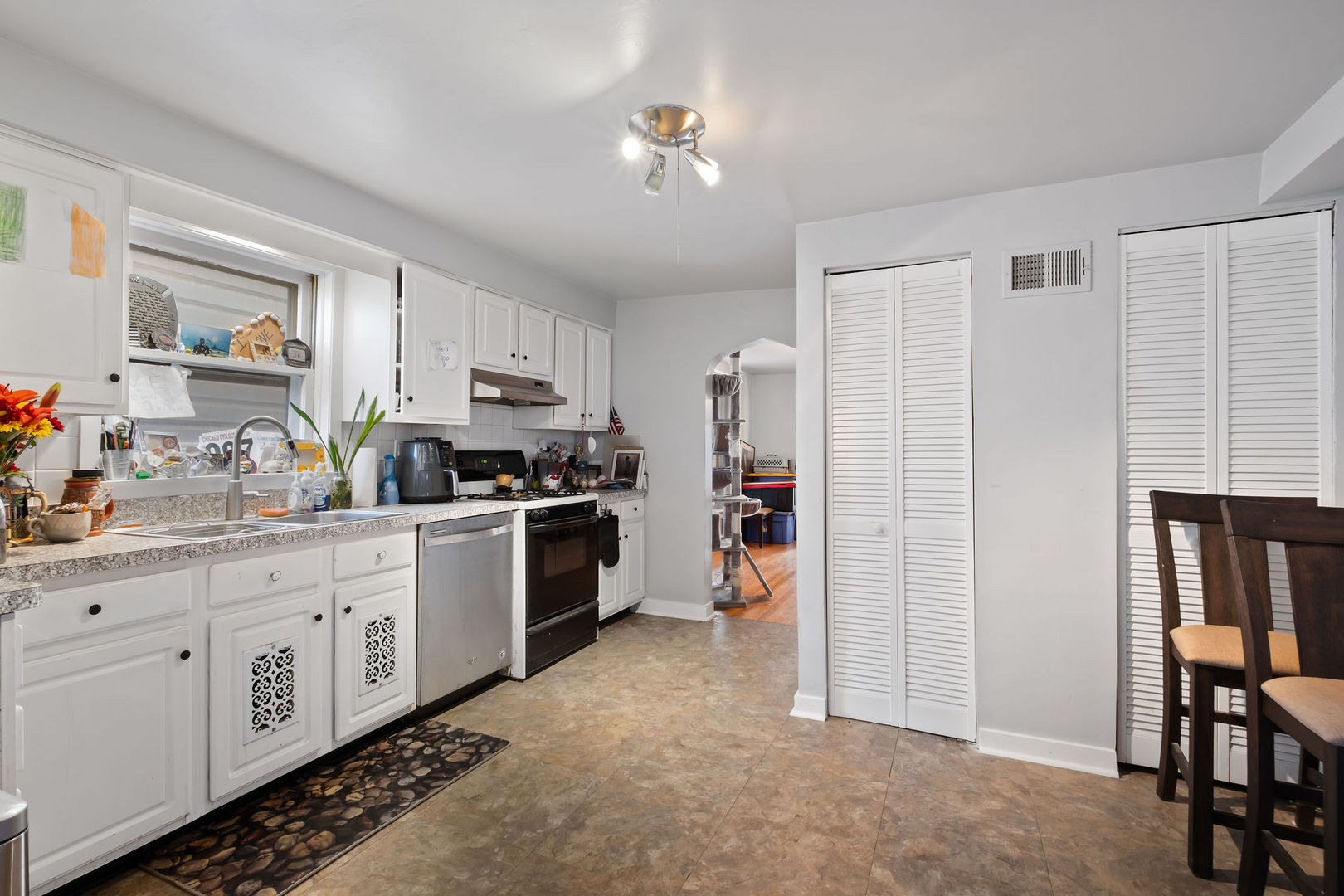 1934 West Race Avenue Chicago, IL 60622 - Photo 14 of 35 a kitchen with sink cabinets and window