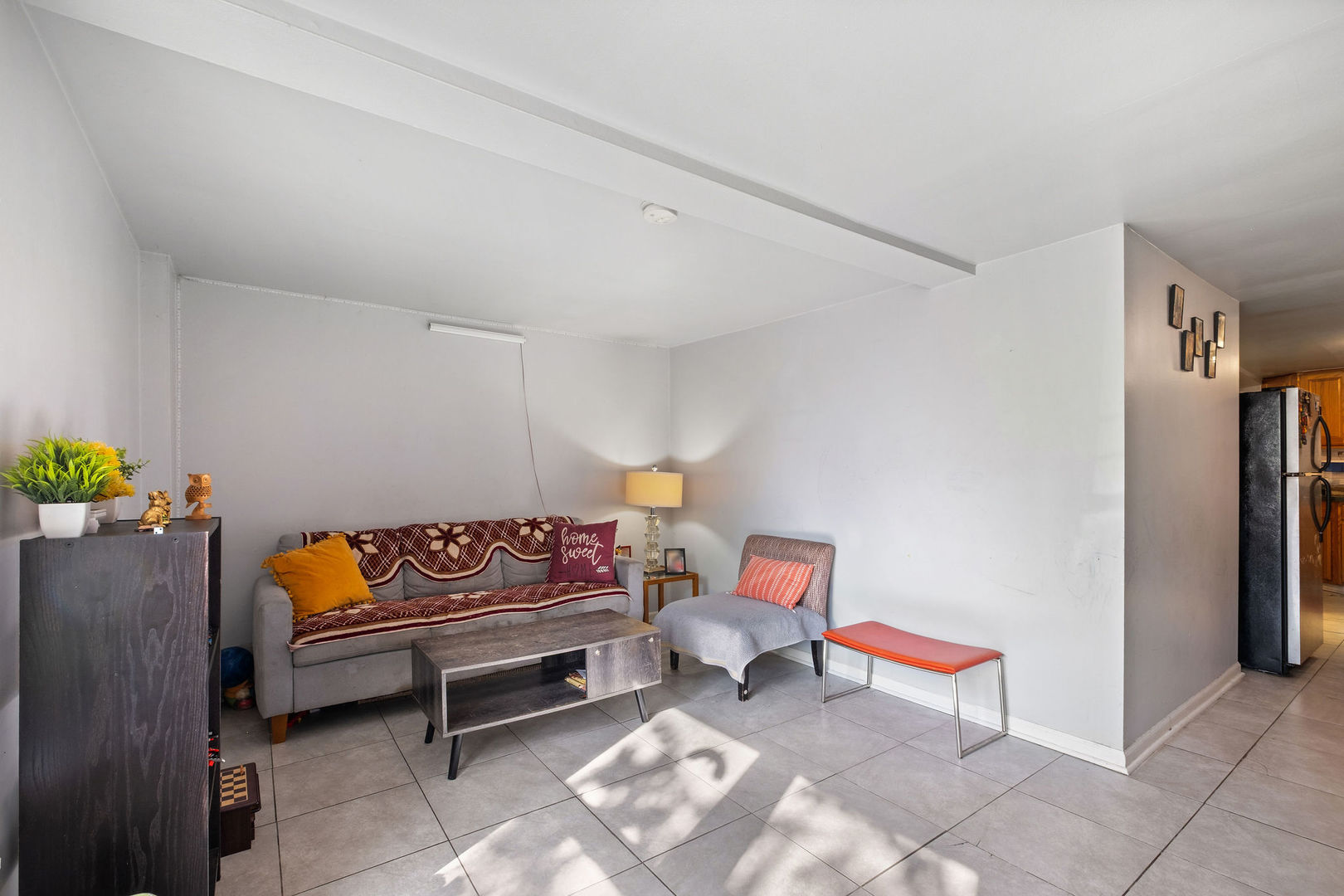 1934 West Race Avenue Chicago, IL 60622 - Photo 18 of 35 a blue bench sitting in a living room with furniture and a couch