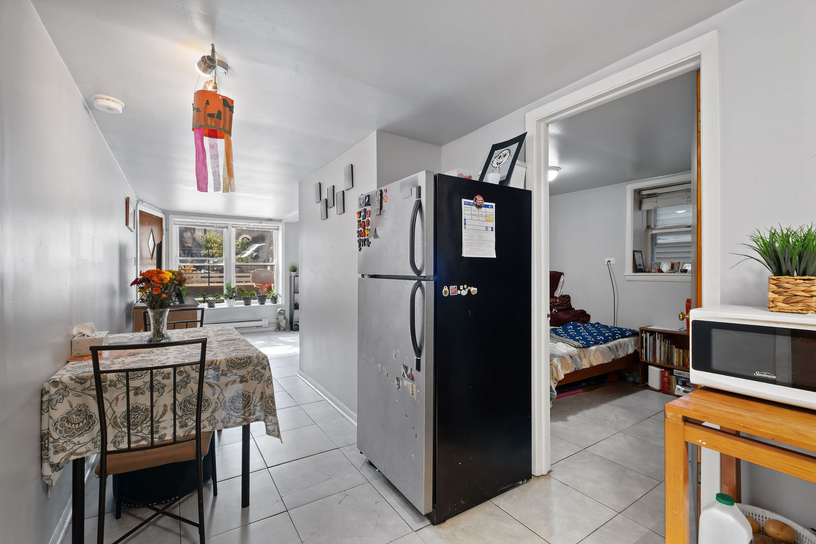1934 West Race Avenue Chicago, IL 60622 - Photo 20 of 35 a kitchen view with a dining table and chairs