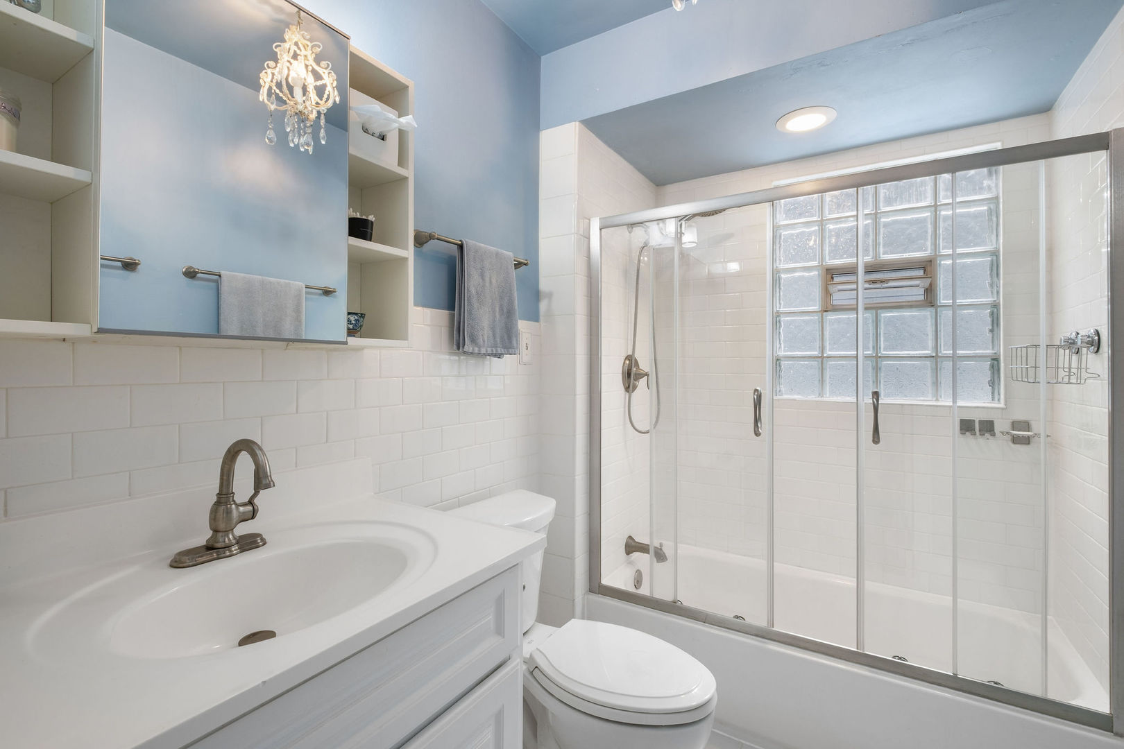 1934 West Race Avenue Chicago, IL 60622 - Photo 24 of 35 a bathroom with a sink a toilet and shower