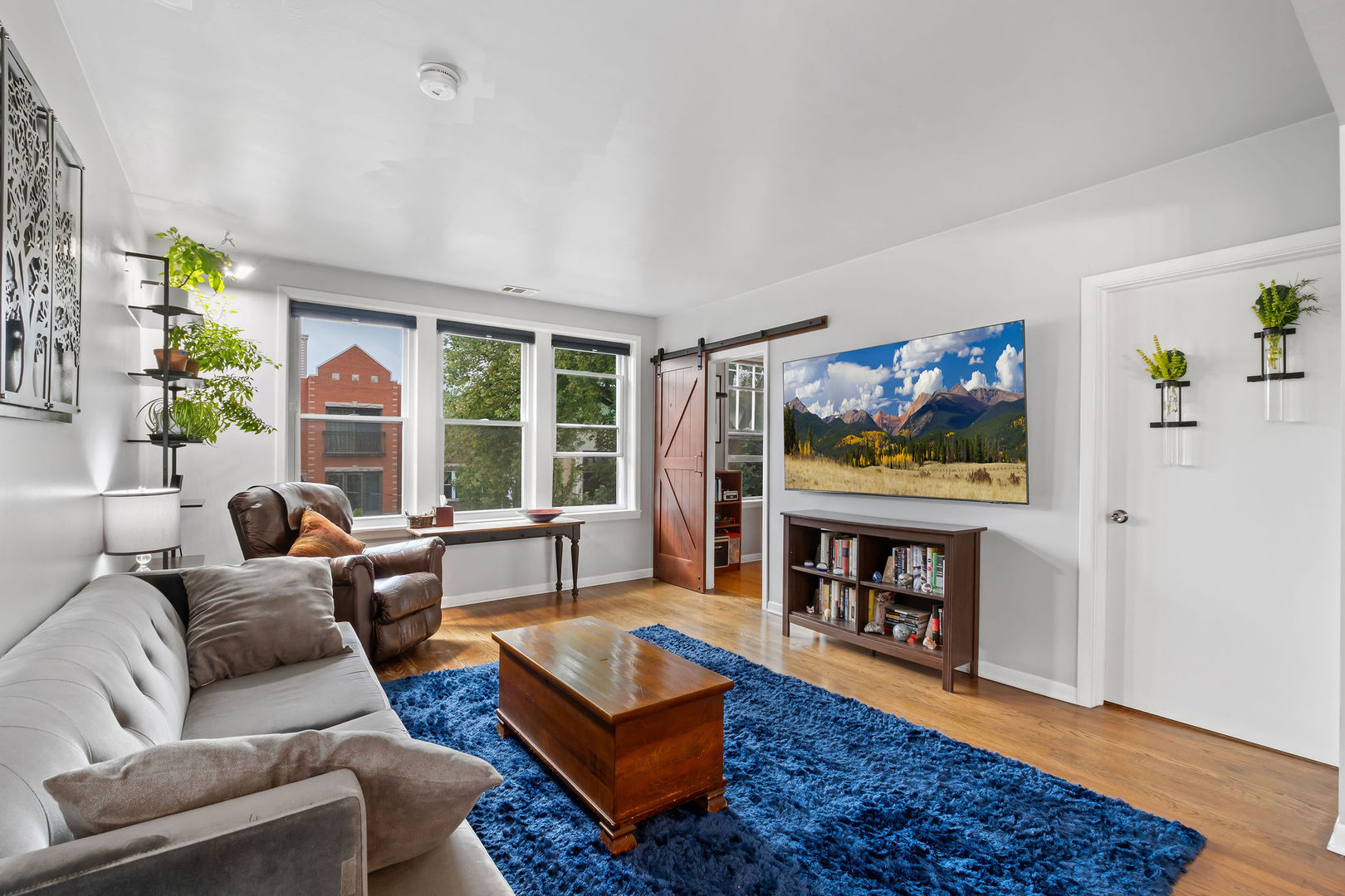 1934 West Race Avenue Chicago, IL 60622 - Photo 4 of 35 a living room with furniture flat screen tv and a fireplace