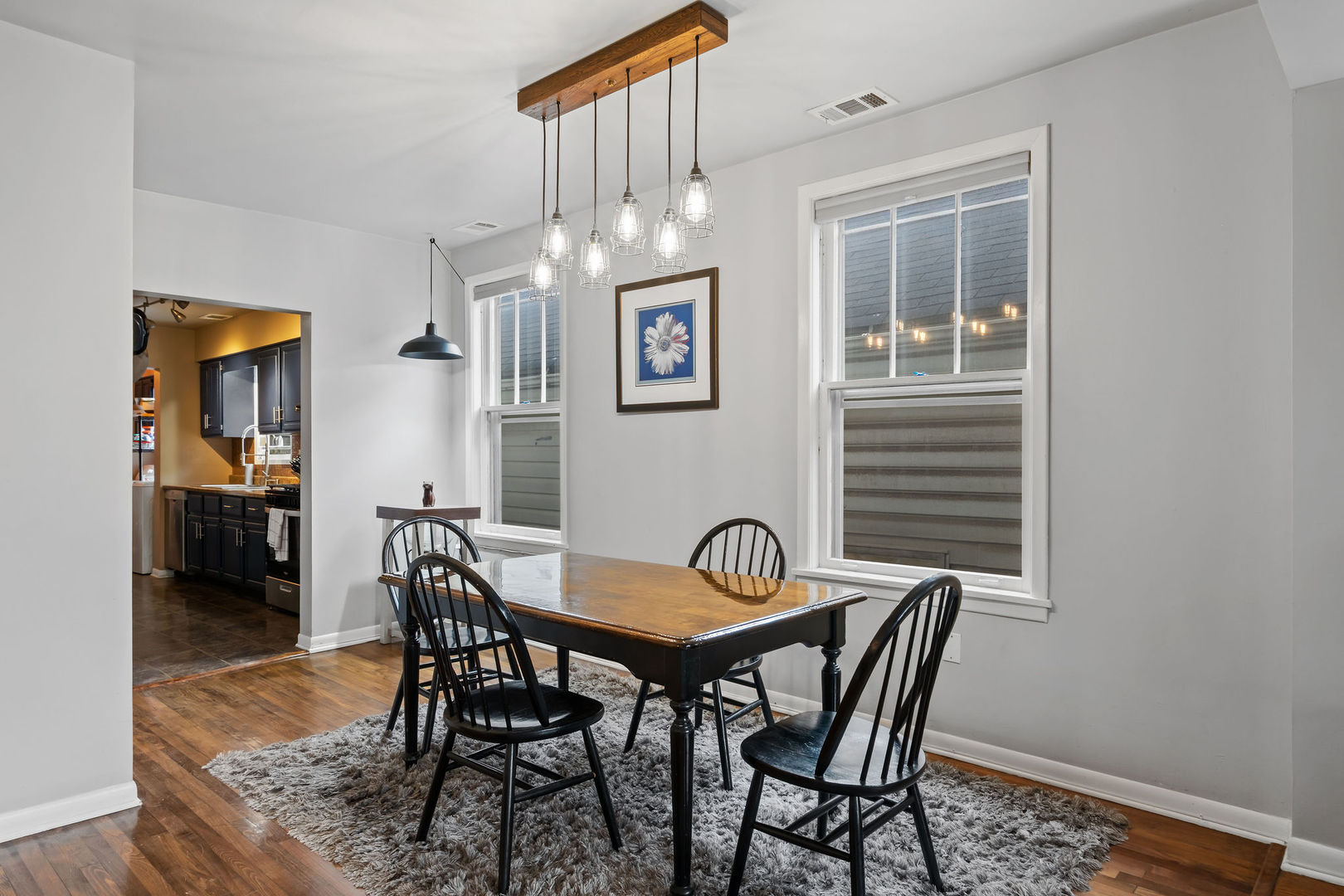 1934 West Race Avenue Chicago, IL 60622 - Photo 5 of 35 a view of a dining room with furniture and wooden floor