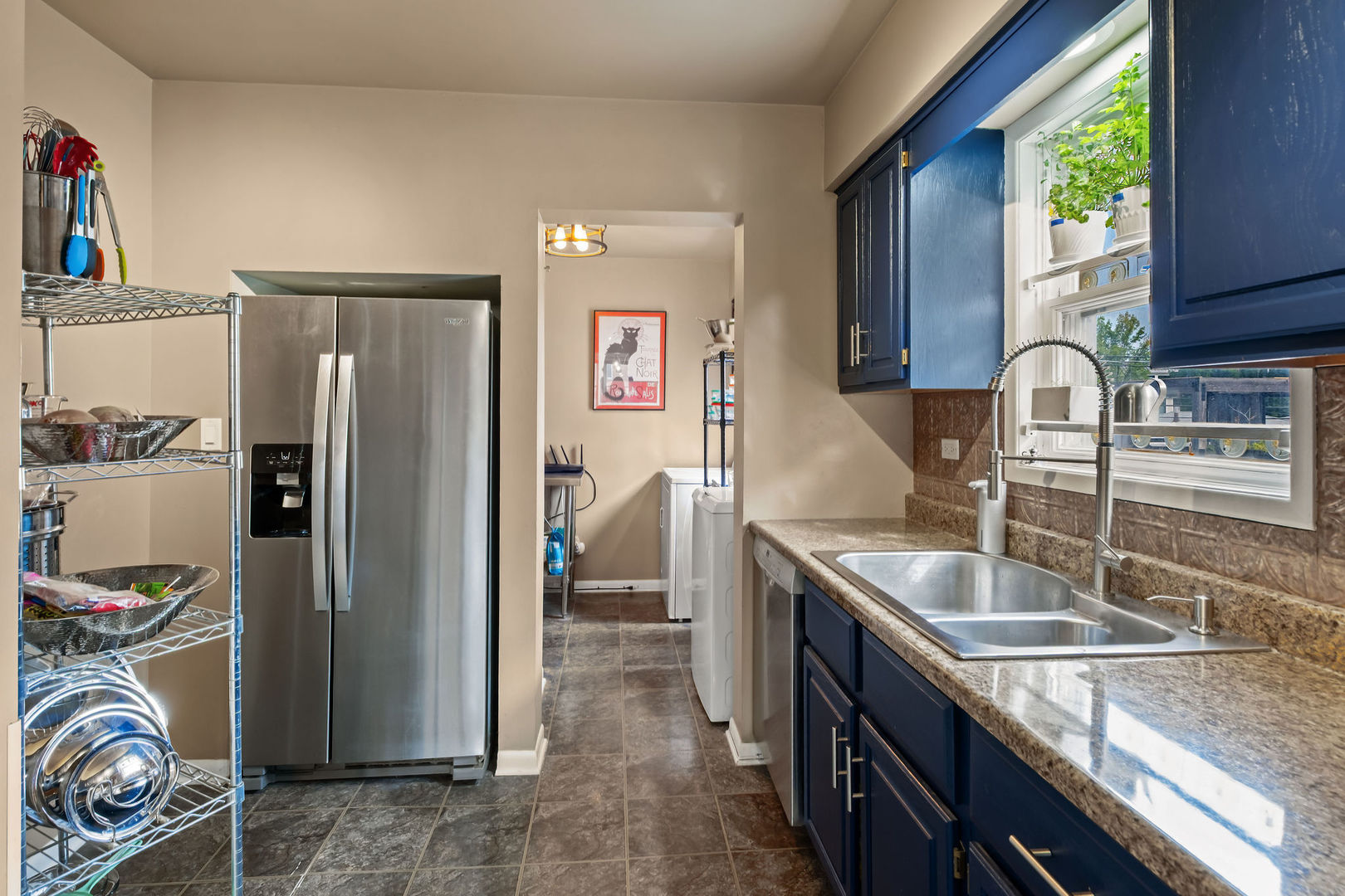 1934 West Race Avenue Chicago, IL 60622 - Photo 8 of 35 a kitchen with stainless steel appliances granite countertop a refrigerator and a sink